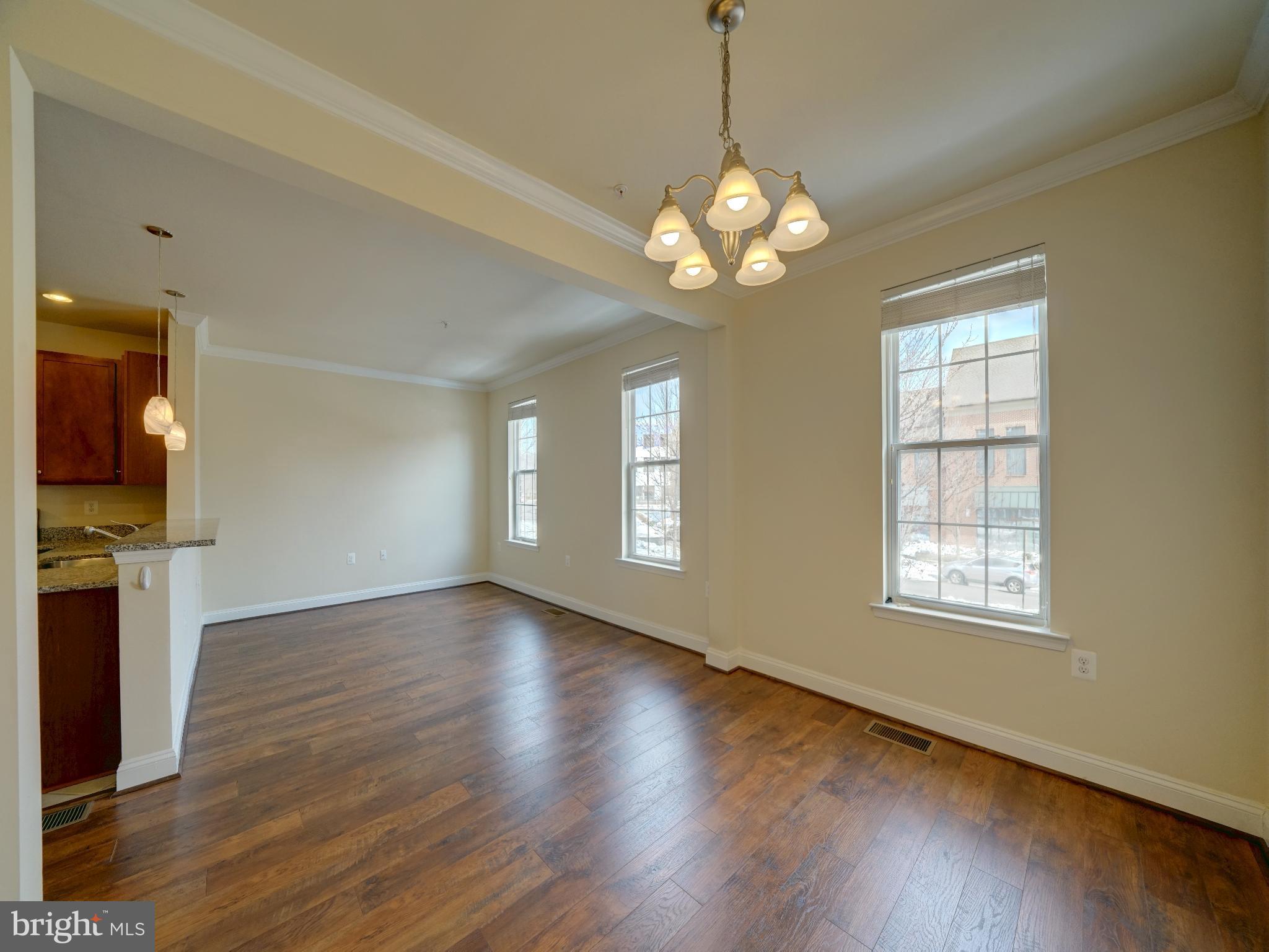 7672 Maple Lawn Boulevard, Unit 53 Fulton, MD 20759 - Photo 15 of 39 Spacious, sunlit living area with charm.