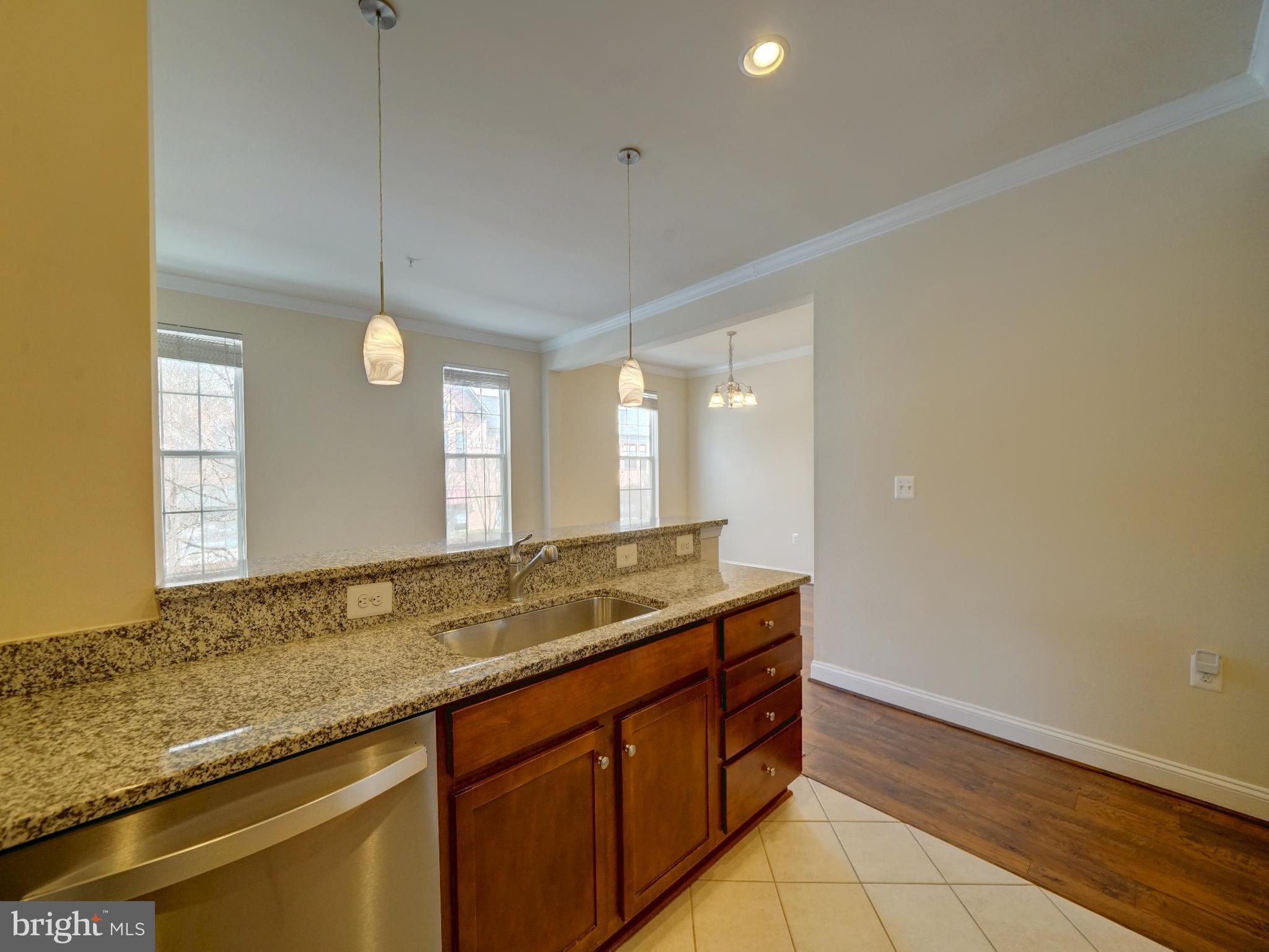 7672 Maple Lawn Boulevard, Unit 53 Fulton, MD 20759 - Photo 20 of 39 Bright and inviting kitchen with modern finishes.