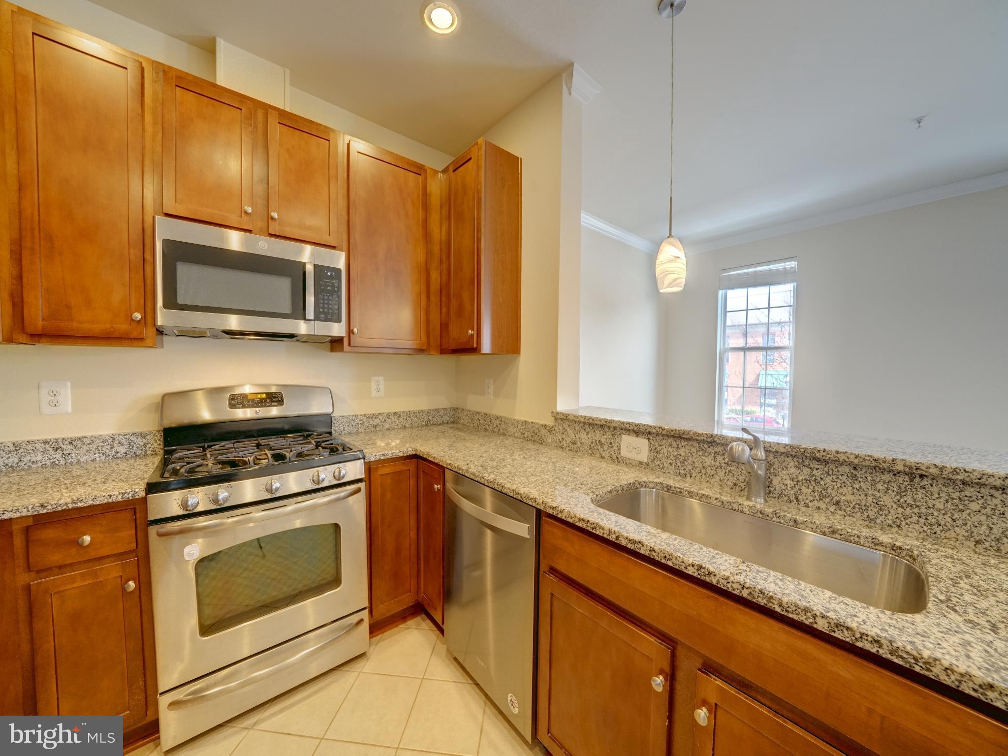 7672 Maple Lawn Boulevard, Unit 53 Fulton, MD 20759 - Photo 23 of 39 Modern kitchen with sleek finishes.