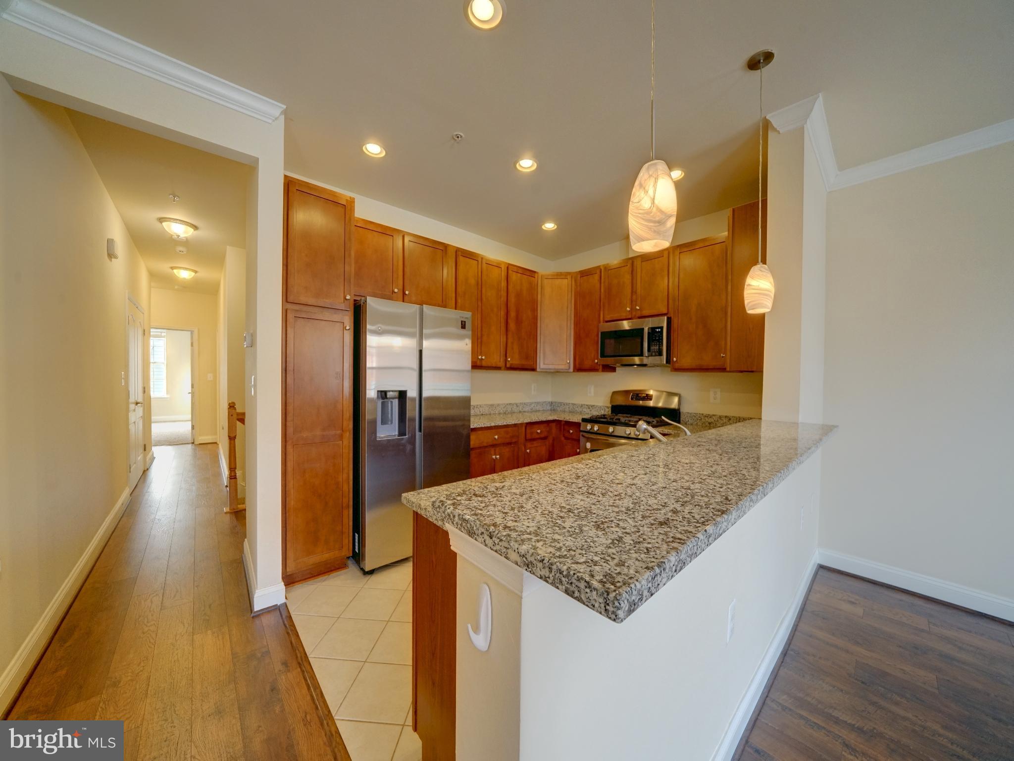 7672 Maple Lawn Boulevard, Unit 53 Fulton, MD 20759 - Photo 24 of 39 Modern kitchen with elegant finishes.