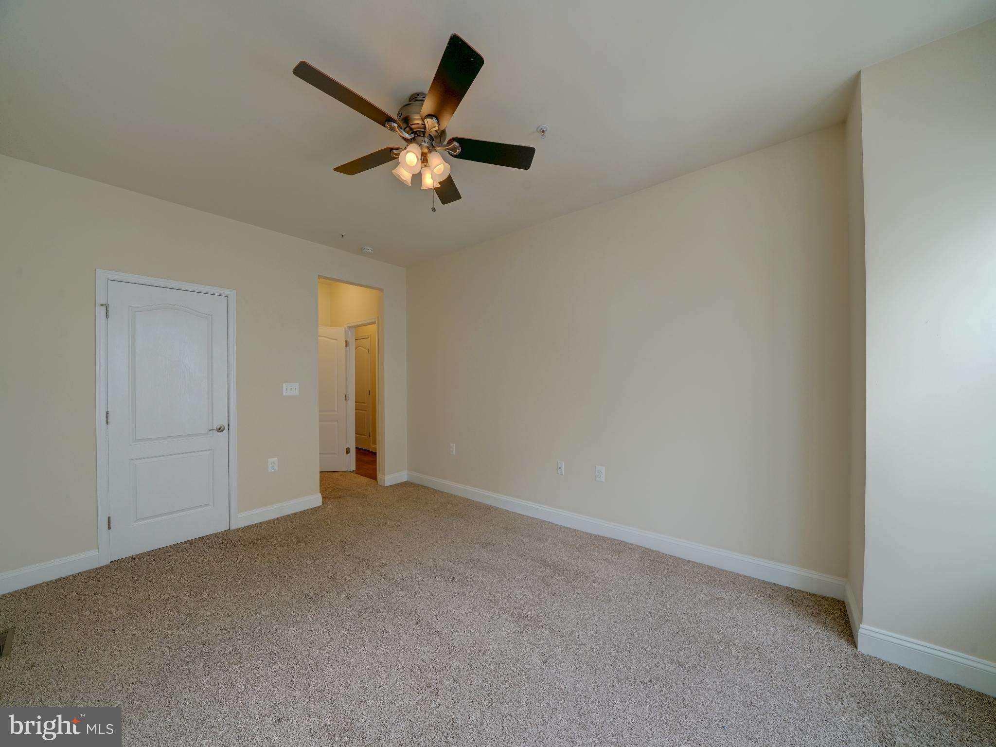 7672 Maple Lawn Boulevard, Unit 53 Fulton, MD 20759 - Photo 28 of 39 Spacious room with soft natural light.