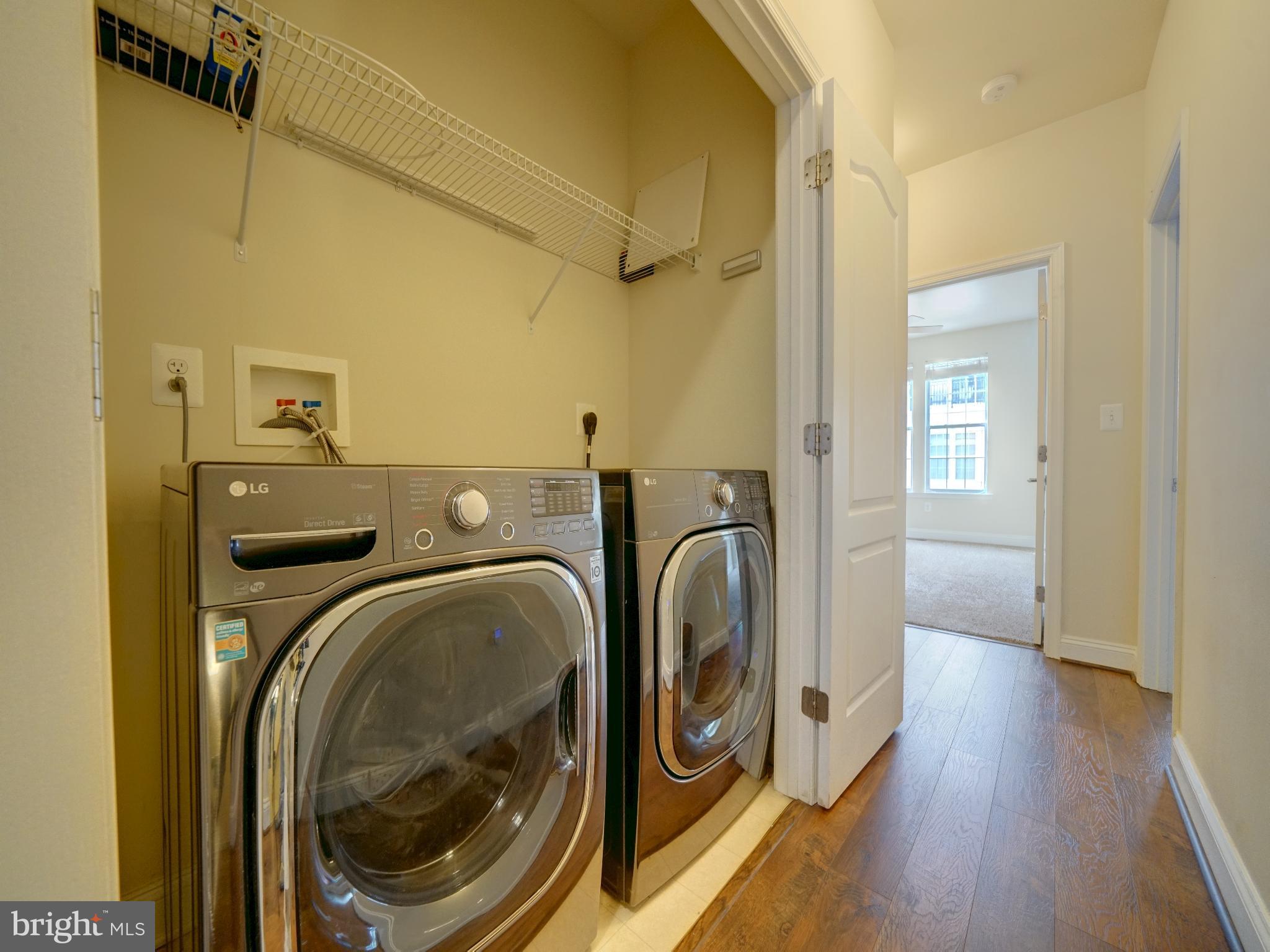 7672 Maple Lawn Boulevard, Unit 53 Fulton, MD 20759 - Photo 37 of 39 Modern laundry nook with sleek appliances.