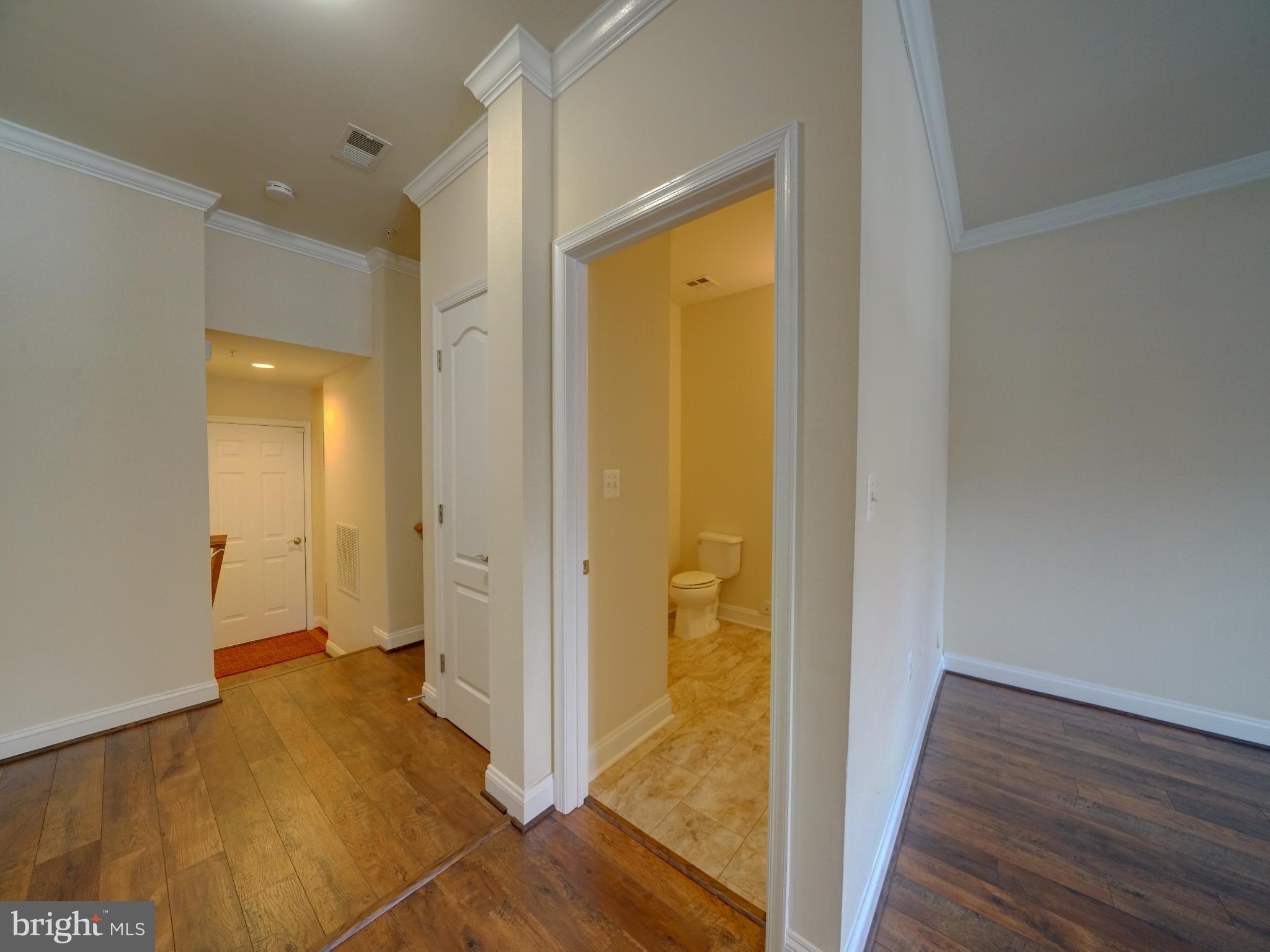 7672 Maple Lawn Boulevard, Unit 53 Fulton, MD 20759 - Photo 6 of 39 Spacious entryway with elegant finishes.