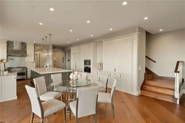 a bathroom with a sink a vanity and a mirror