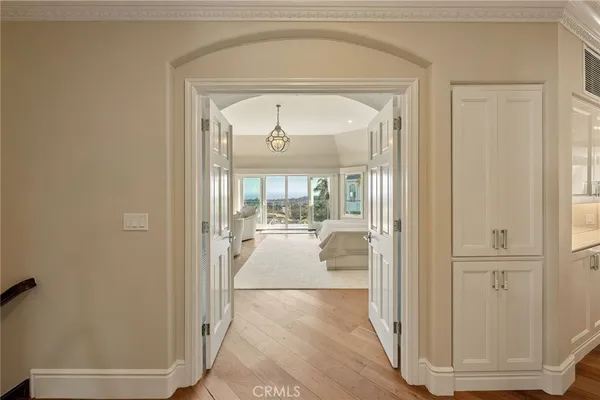 a bed room with a bed and a television