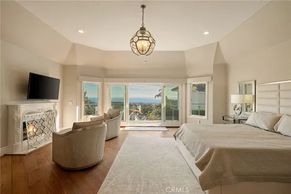 a spacious bathroom with a double vanity sink a mirror and a bathtub