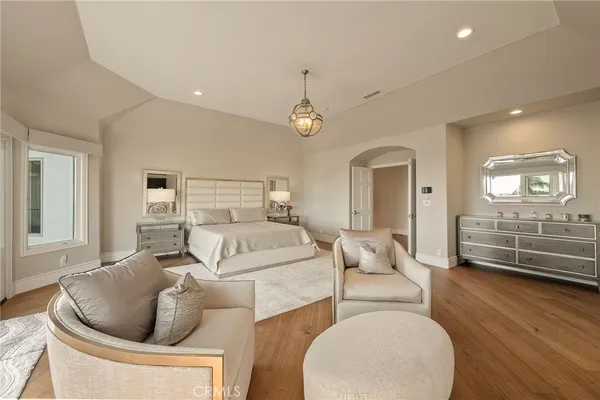 a bathroom with a shower and a glass door