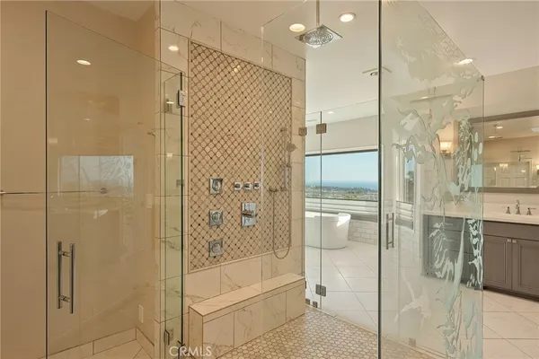 a bedroom with a bed dresser and a window