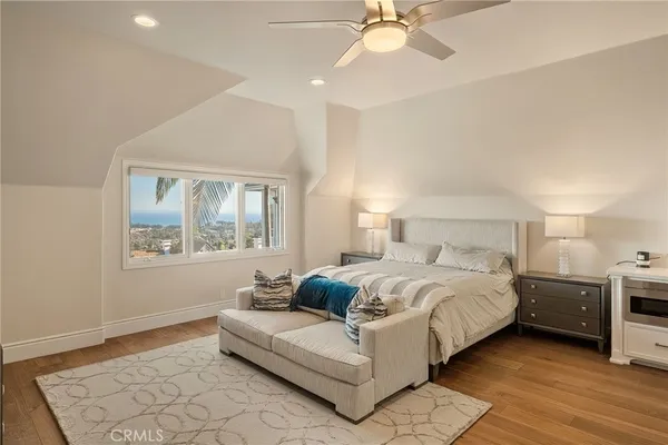 a bathroom with a sink vanity granite and a mirror