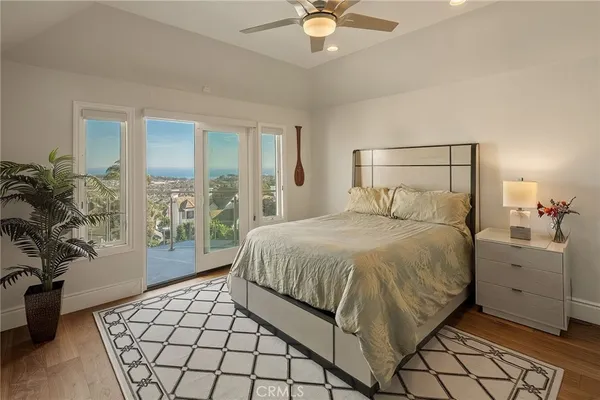 a bathroom with a sink a mirror and next to a window