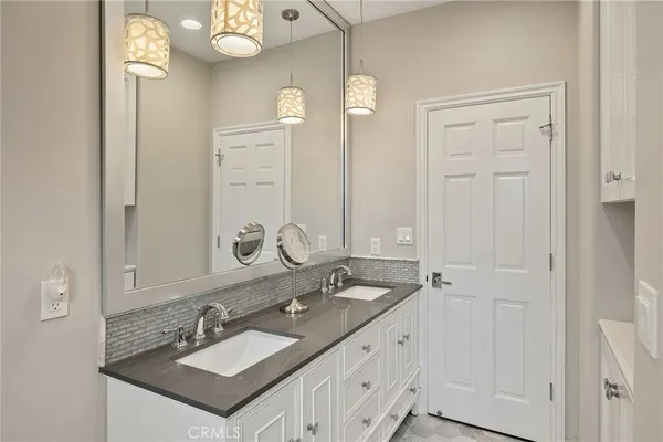 an aerial view of a house with a big yard