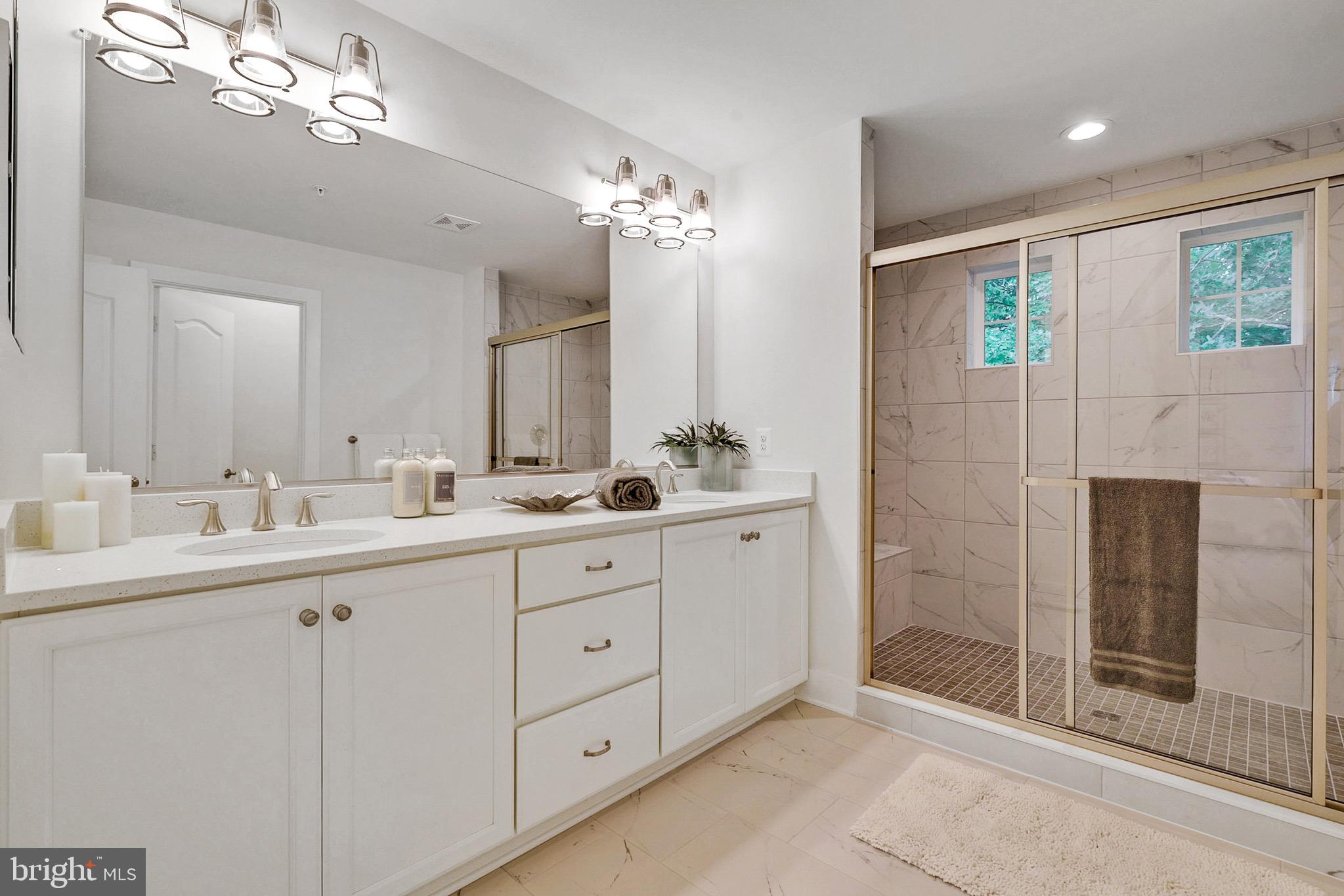 112 Red Rose Court Elkton, MD 21921 - Photo 10 of 10 a bathroom with double sink and a mirror