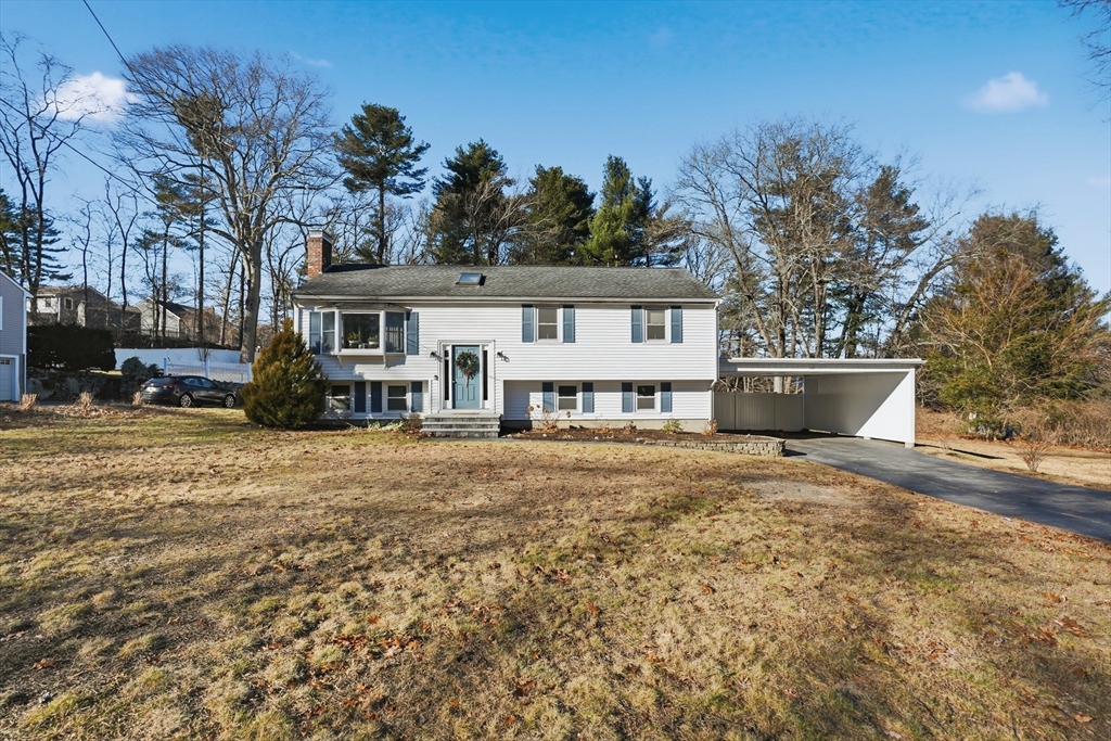 492 Elm Street Framingham, MA 01701 - Photo 1 of 27 front view of a house with a yard