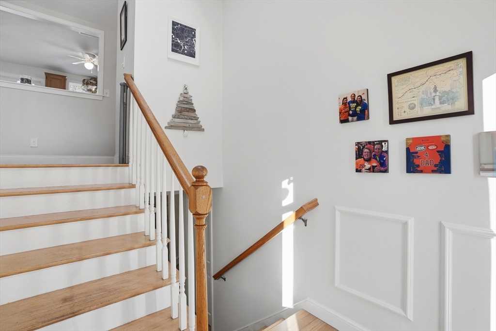 492 Elm Street Framingham, MA 01701 - Photo 14 of 27 a view of entryway with furniture and stairs