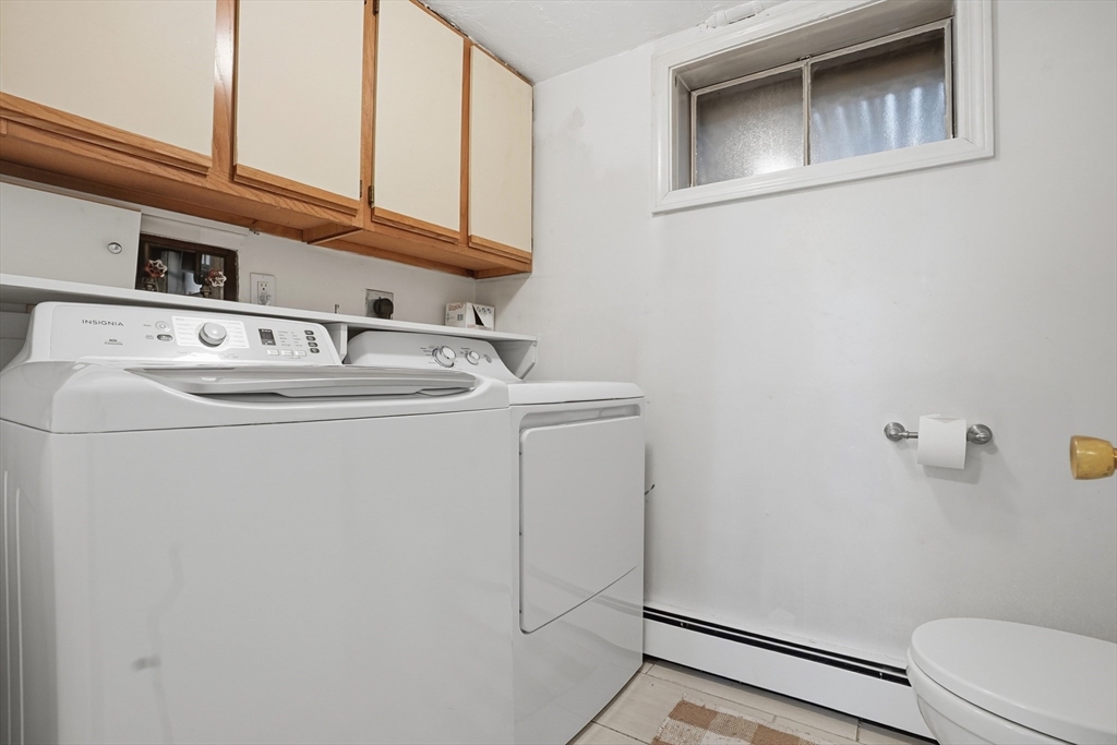 492 Elm Street Framingham, MA 01701 - Photo 17 of 27 a utility room with dryer and washer