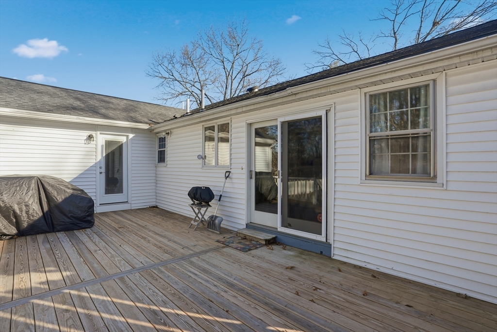 492 Elm Street Framingham, MA 01701 - Photo 20 of 27 a view of a house with wooden deck