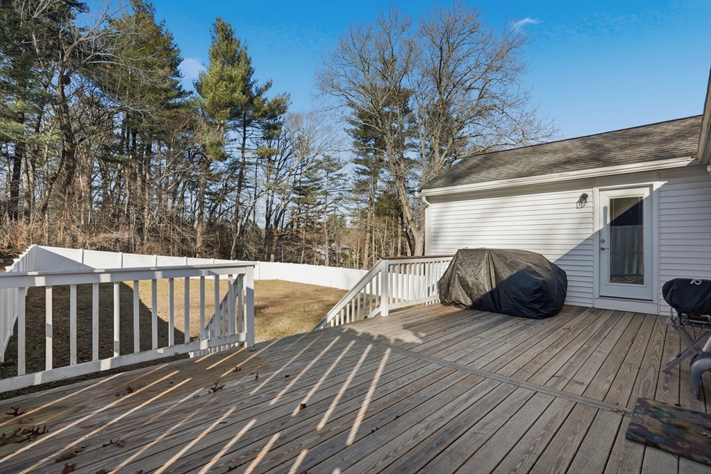 492 Elm Street Framingham, MA 01701 - Photo 21 of 27 a view of balcony with wooden floor and outdoor seating