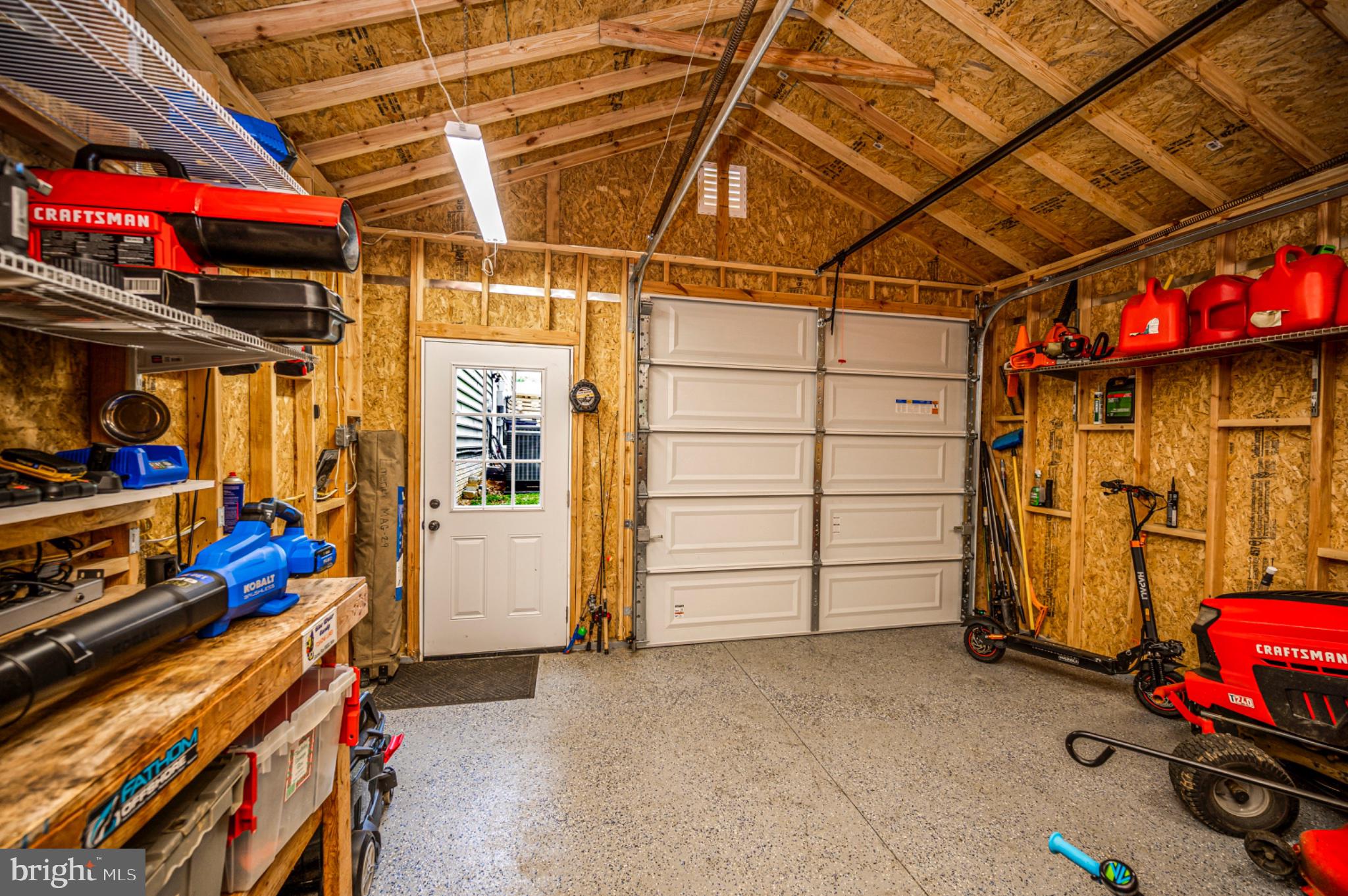 239 Toluca Road Stafford, VA 22556 - Photo 20 of 75 Spacious garage with organized tools.