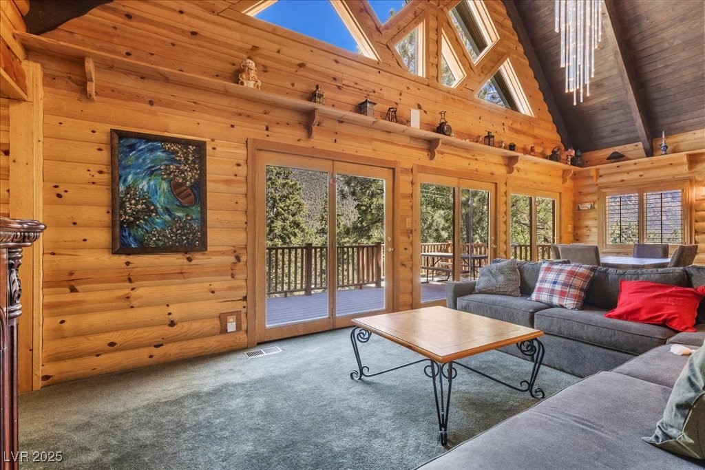 370 Alpine Way Mount Charleston, NV 89124 - Photo 4 of 79 Wrapped in rich knotty pine log siding inside & out.