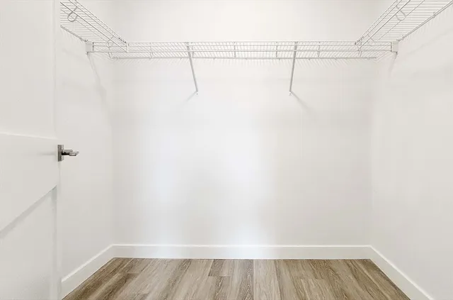 a view of a room with racks on the wall