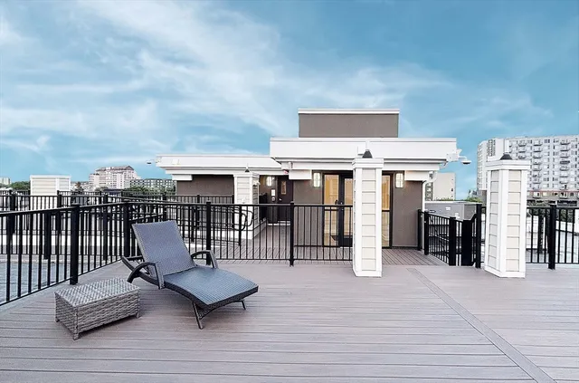 a picture of a room with a floor to ceiling window