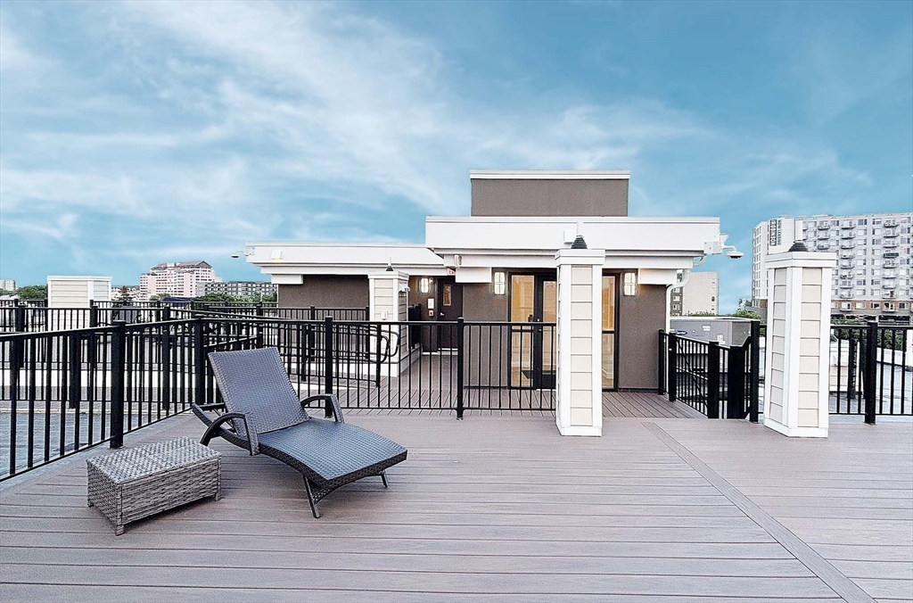1133 North Shore Road, Unit 205 Revere, MA 02151 - Photo 15 of 16 a view of a terrace with furniture