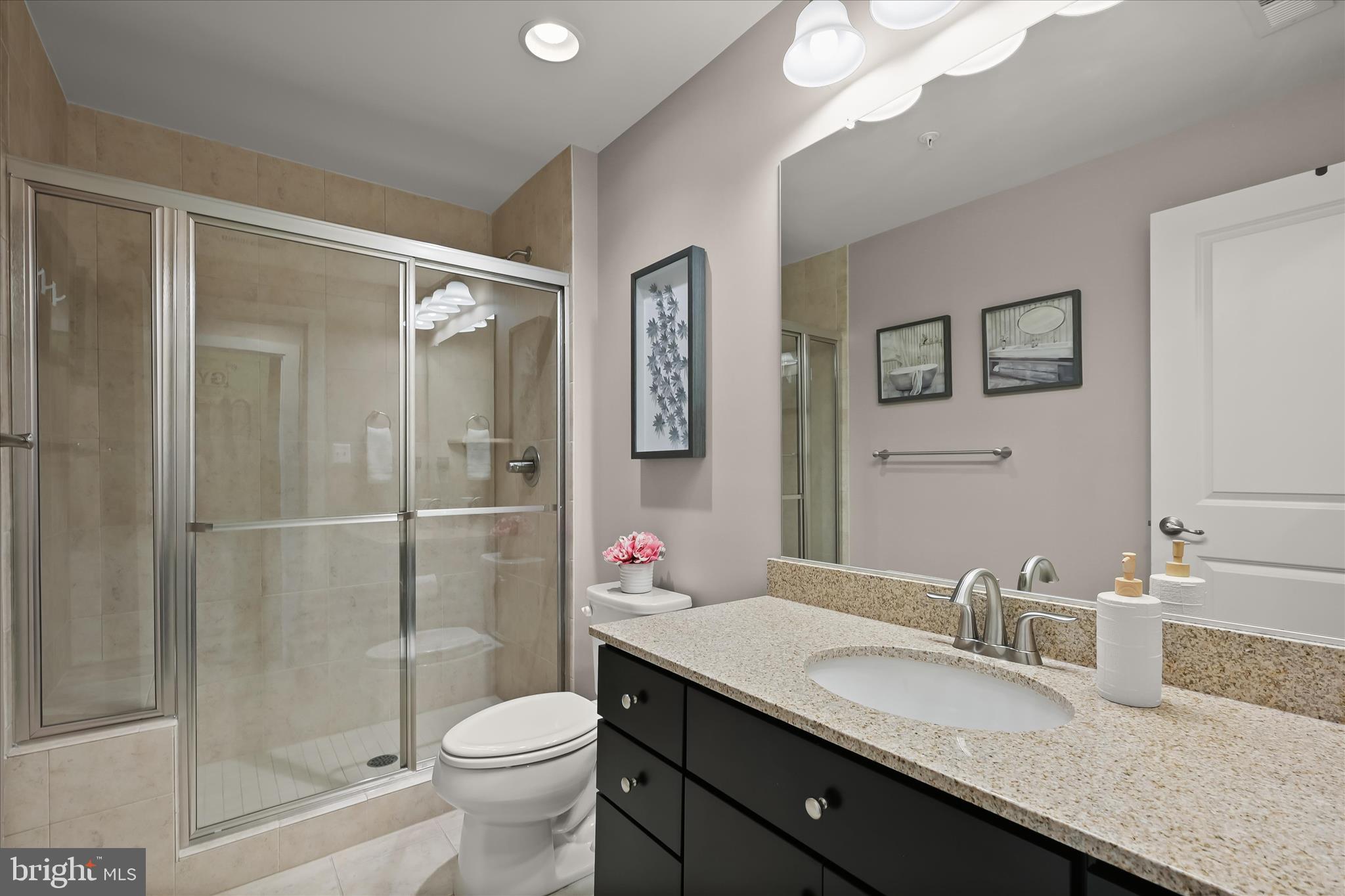 11285 Terrace Lane Fulton, MD 20759 - Photo 8 of 52 a bathroom with a granite countertop sink toilet and shower