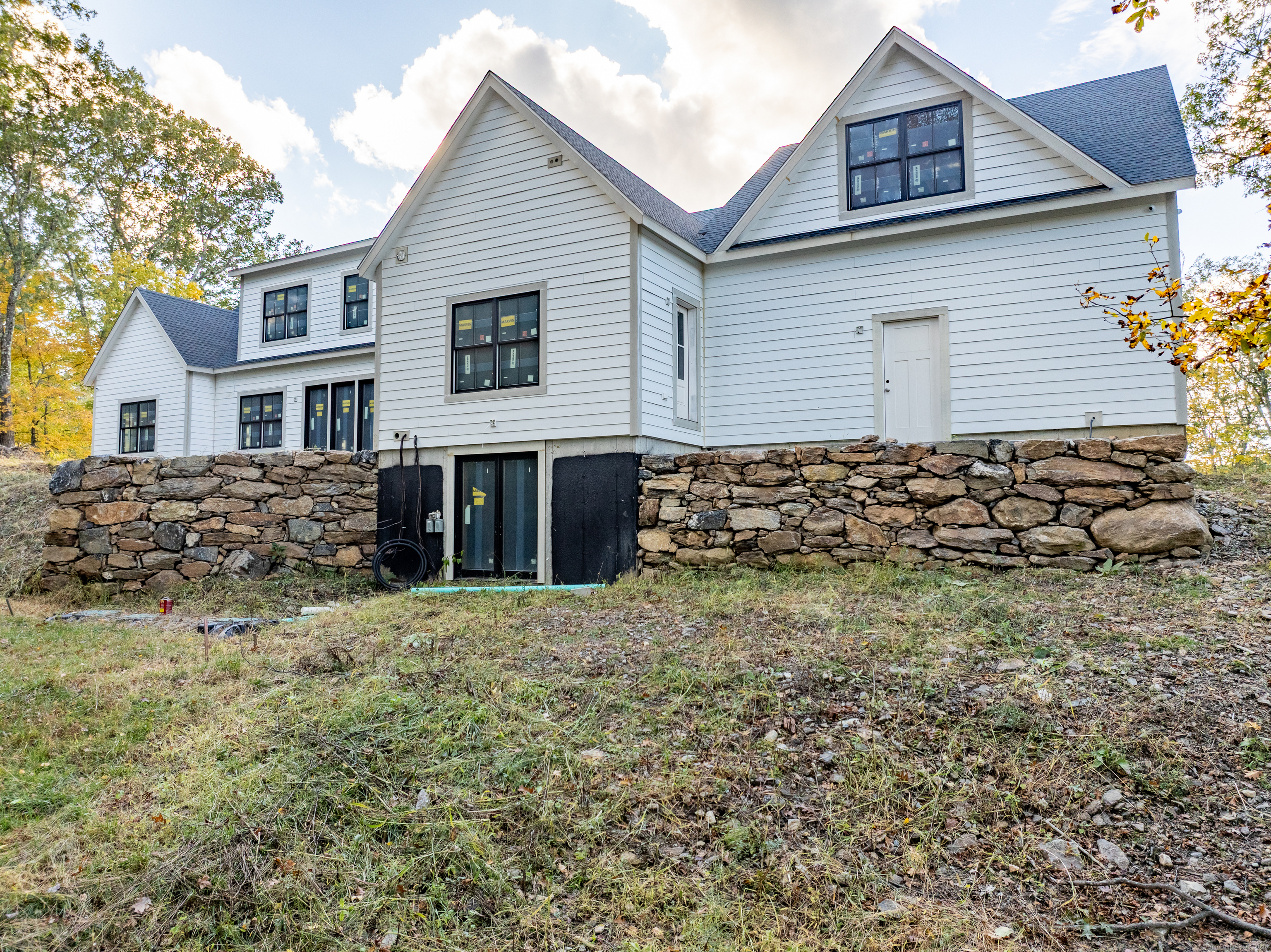 255 Great Plain Road Danbury, CT 06811 - Photo 13 of 20 a view of a house with a yard