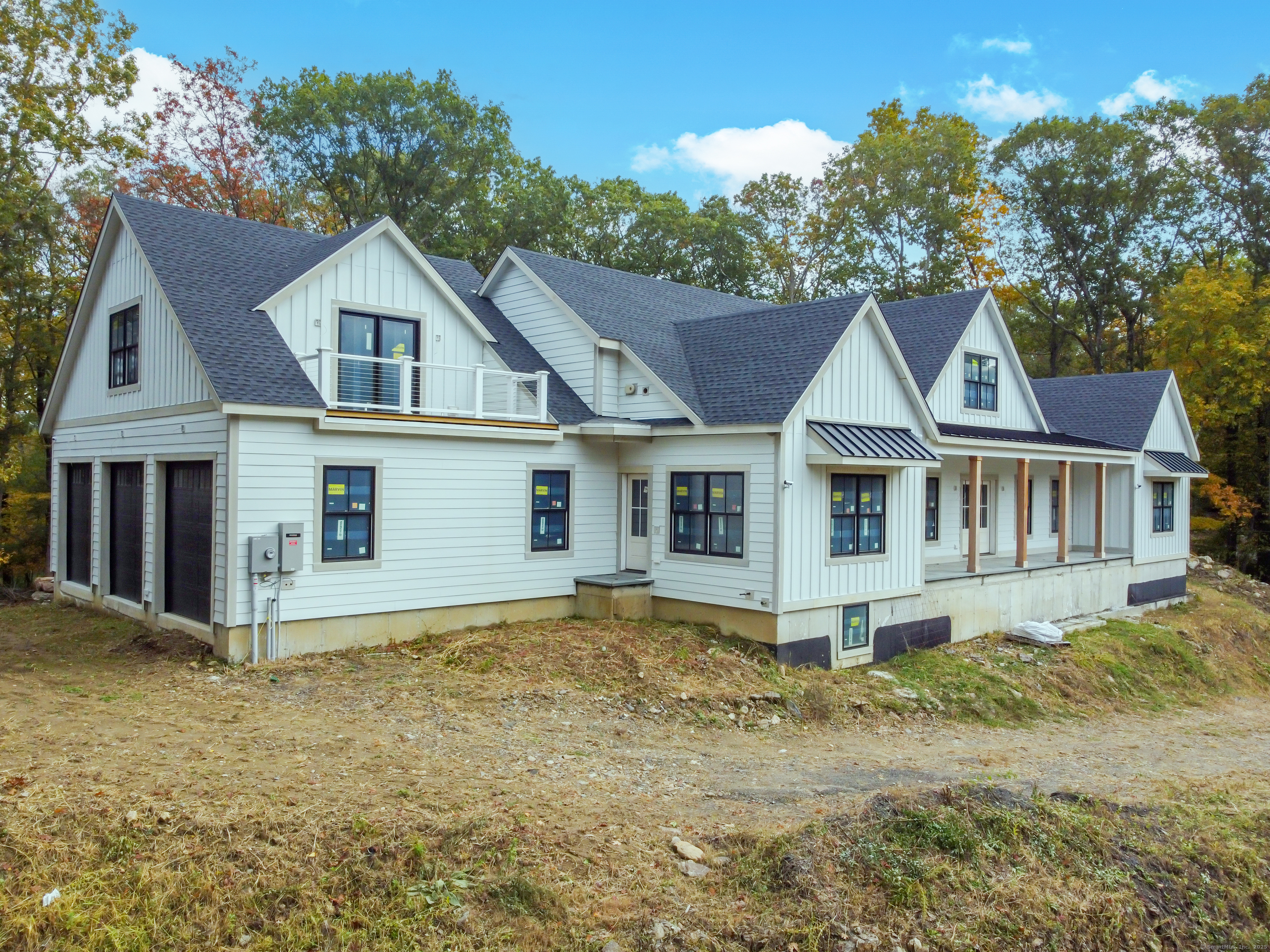 255 Great Plain Road Danbury, CT 06811 - Photo 2 of 20 a front view of a house with a yard