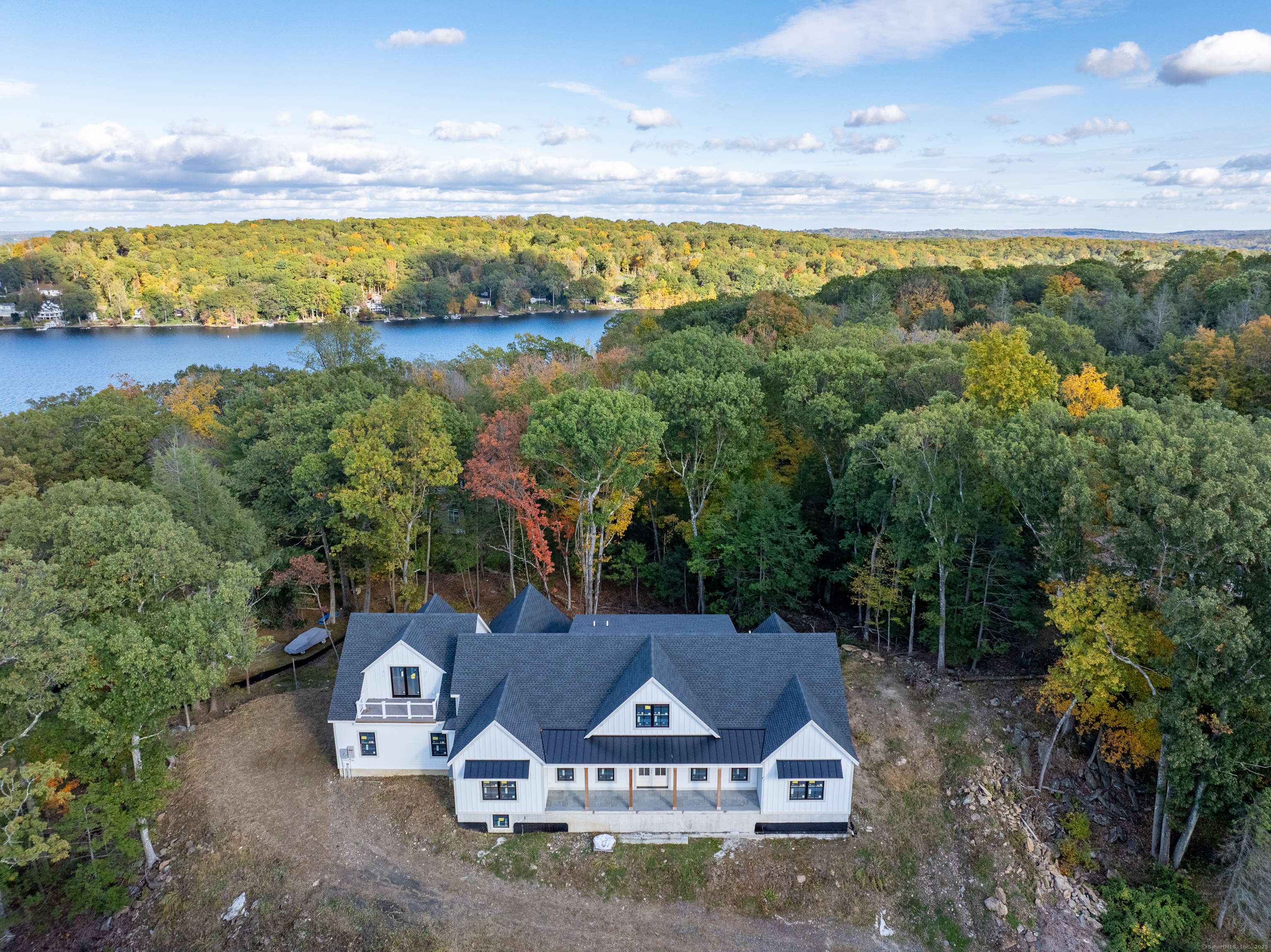 255 Great Plain Road Danbury, CT 06811 - Photo 4 of 20 a view of a lake with a big yard