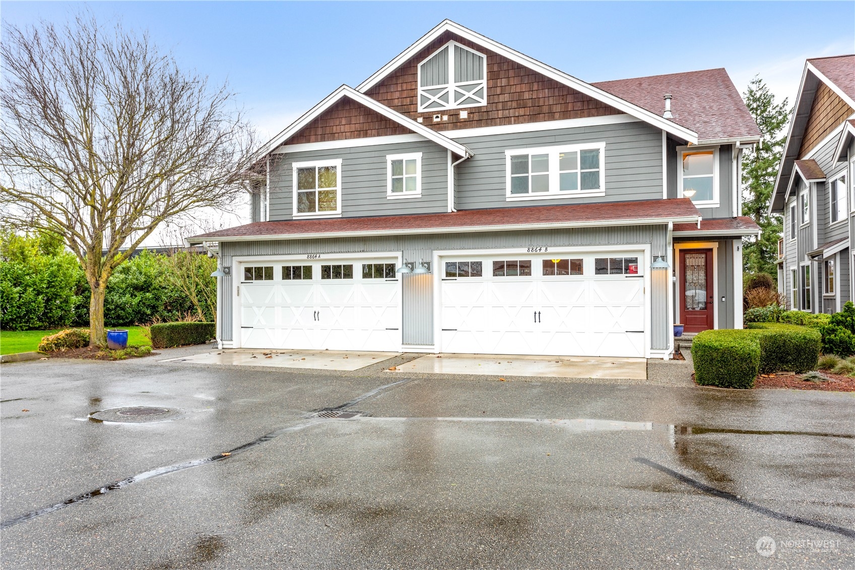 8864 Depot Road, Unit B Lynden, WA 98264 - Photo 3 of 39 a front view of a house with a yard and garage