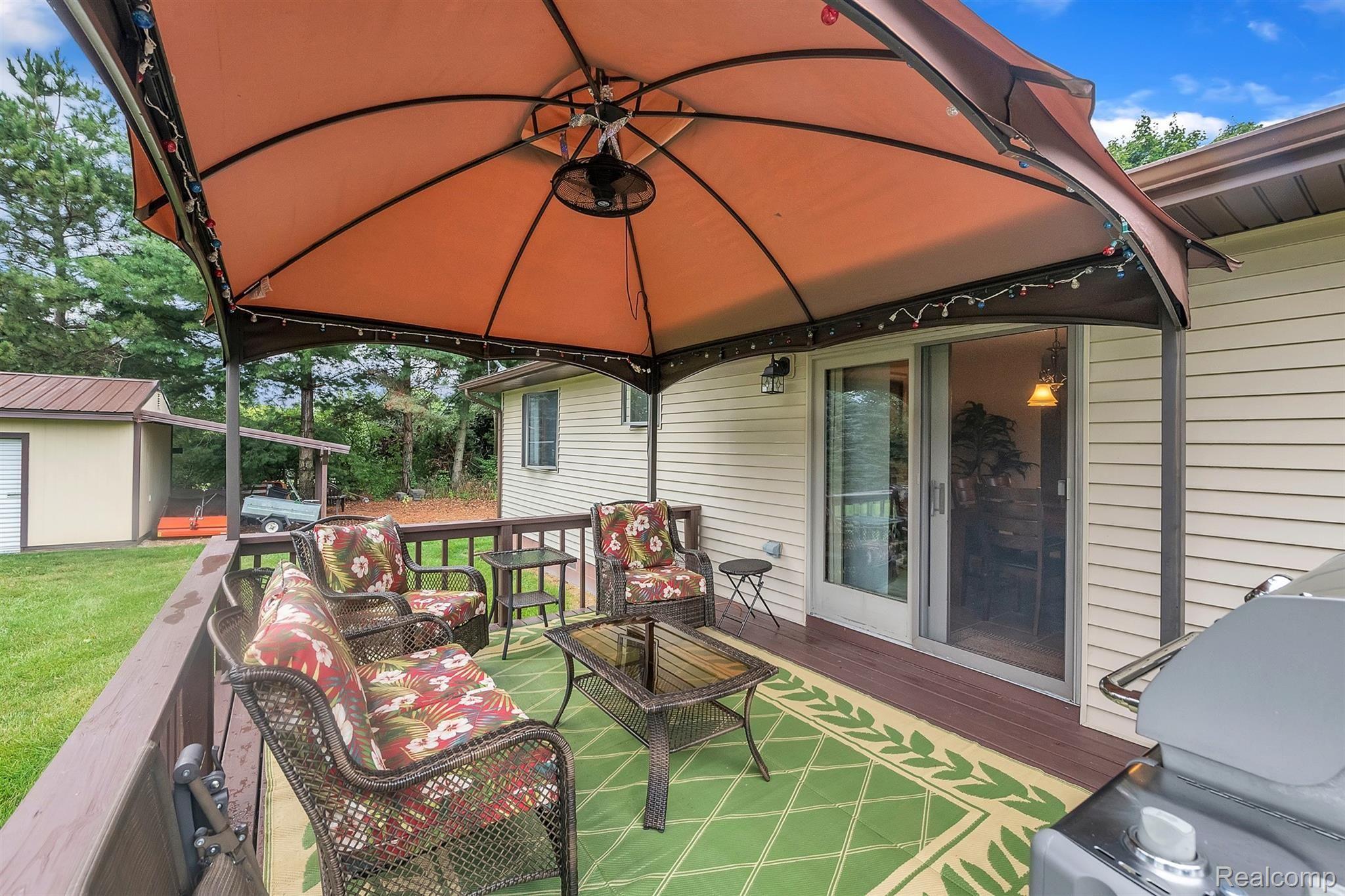 3876 Innisfree Road Howell, MI 48855 - Photo 20 of 31 Newly Stained Deck