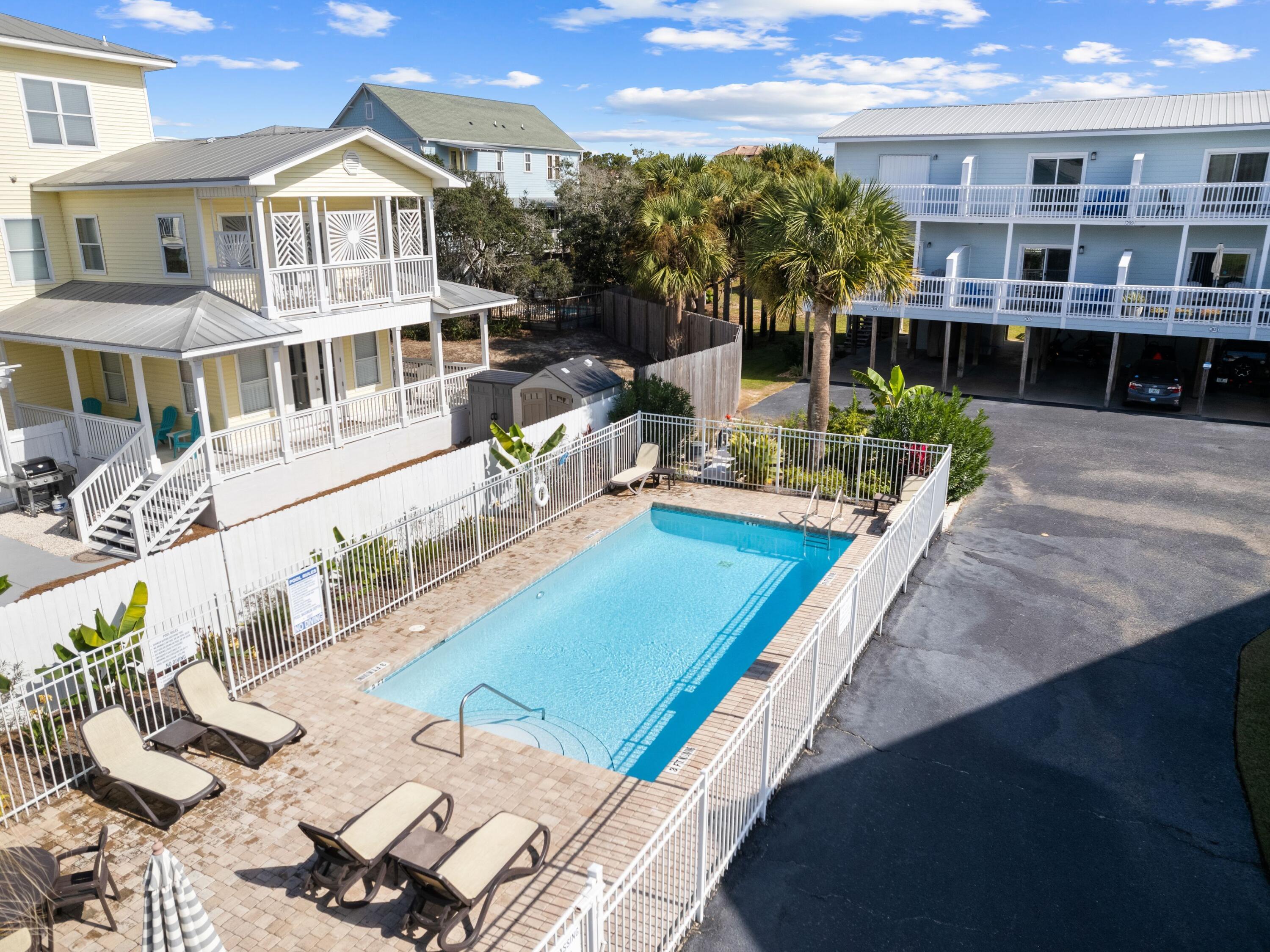 209 Blue Mountain Road, Unit 302 Santa Rosa Beach, FL 32459 - Photo 34 of 40 an aerial view of a house with swimming pool