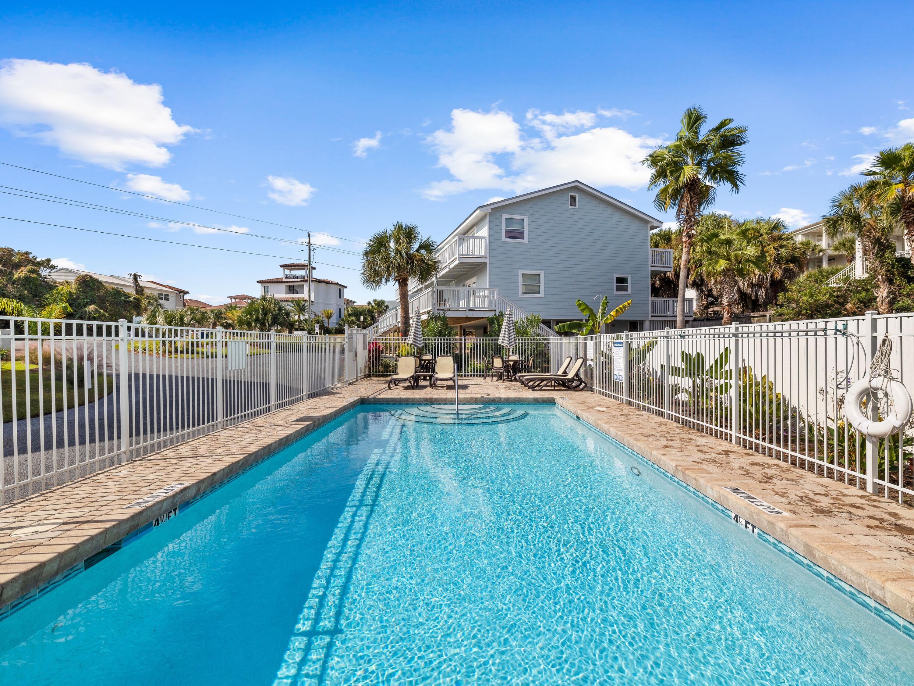 209 Blue Mountain Road, Unit 302 Santa Rosa Beach, FL 32459 - Photo 36 of 40 a view of a house with a swimming pool