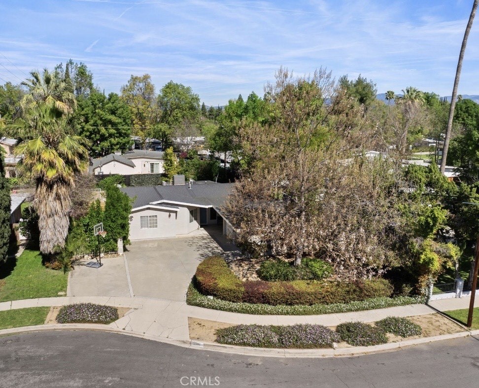 18817 Stagg Street Reseda, CA 91335 - Photo 1 of 1 a view of a garden with potted plants