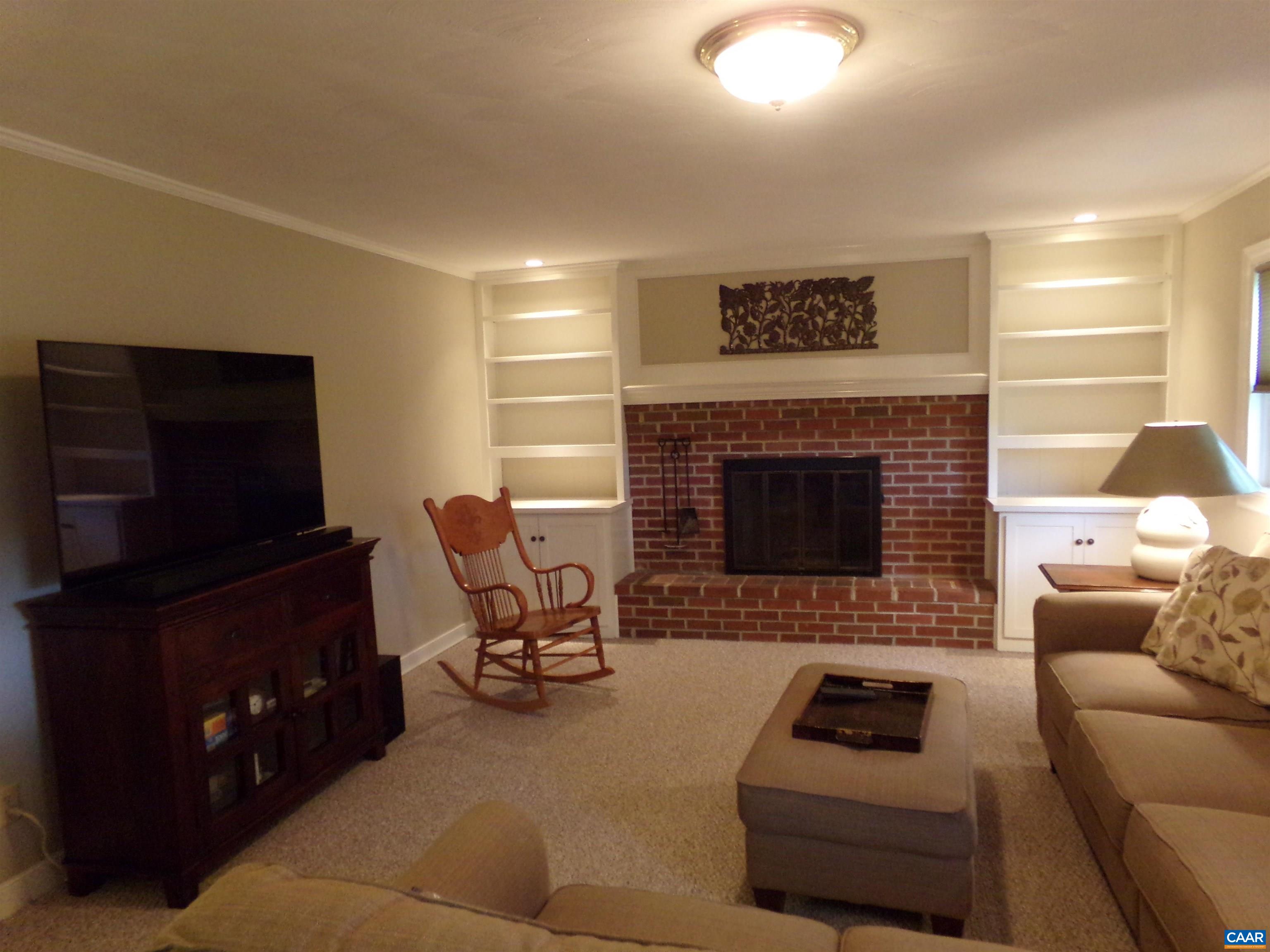 3011 Colonial Drive Charlottesville, VA 22911 - Photo 12 of 35 a living room with furniture and a fireplace