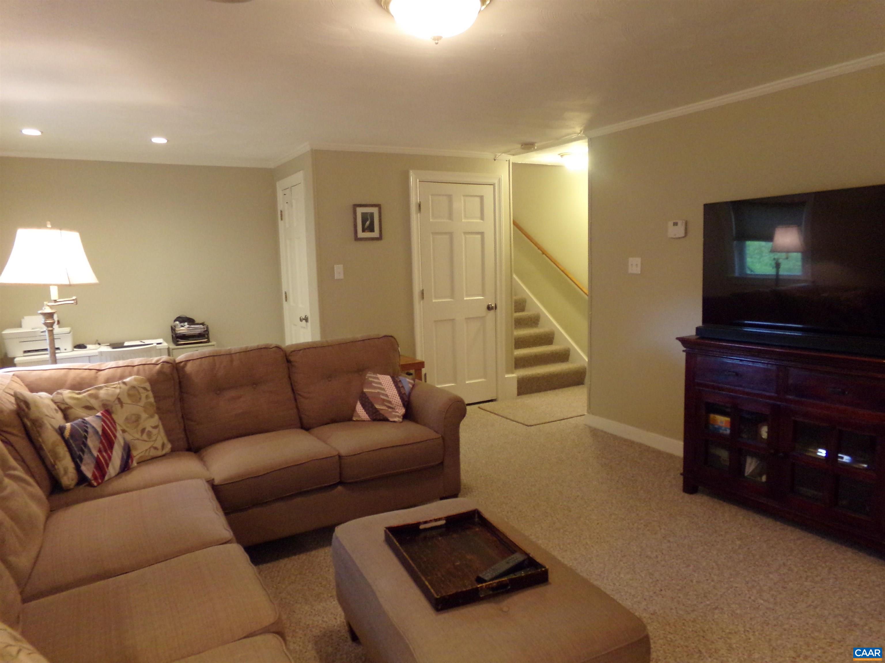 3011 Colonial Drive Charlottesville, VA 22911 - Photo 13 of 35 a living room with furniture and a flat screen tv