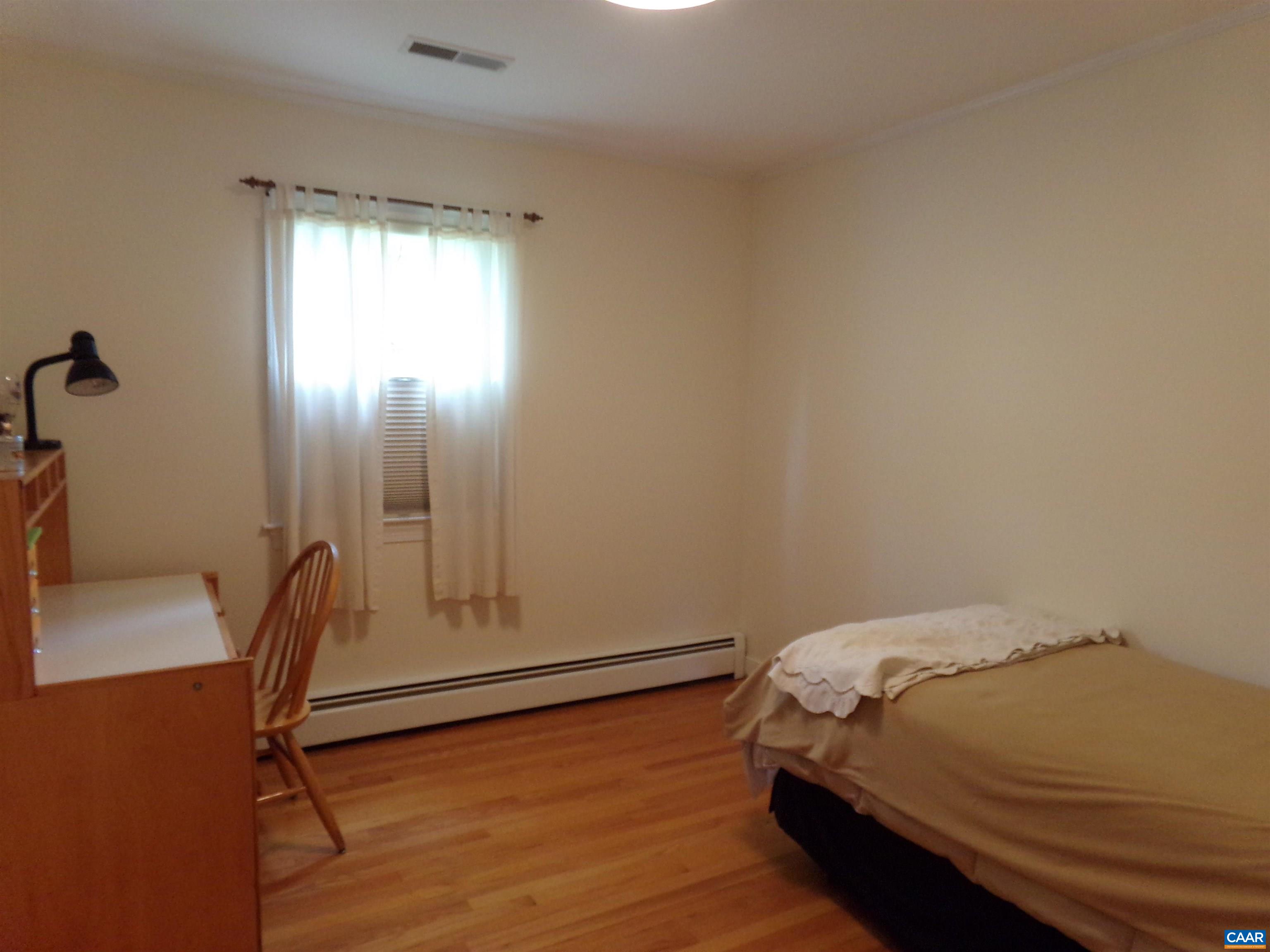 3011 Colonial Drive Charlottesville, VA 22911 - Photo 23 of 35 a bedroom with a bed and a window
