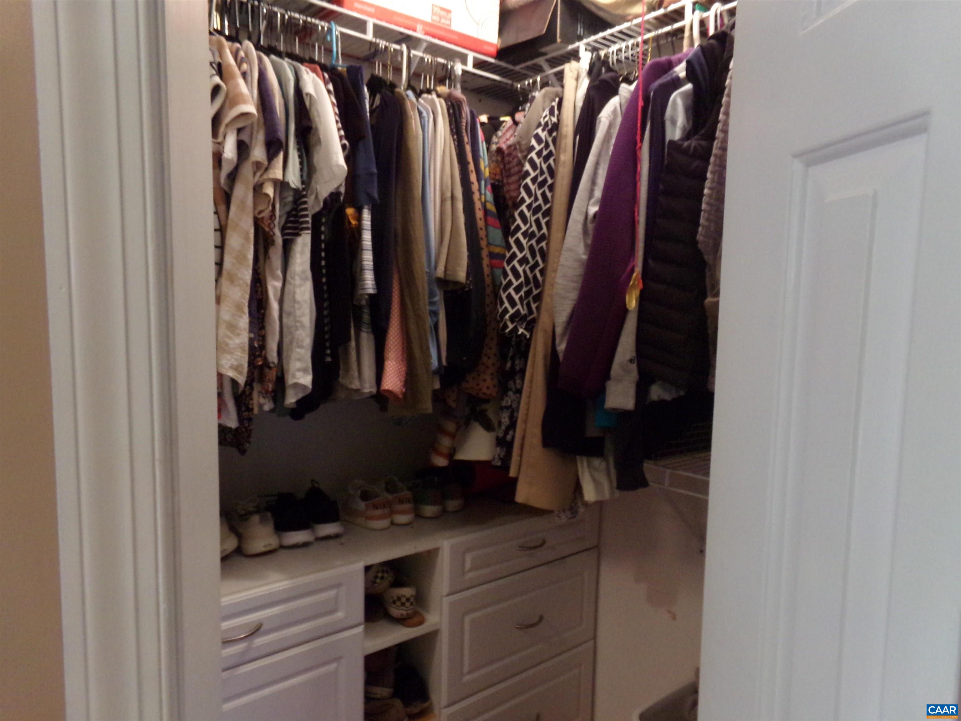 3011 Colonial Drive Charlottesville, VA 22911 - Photo 27 of 35 a view of walk in closet with clothes and shoes
