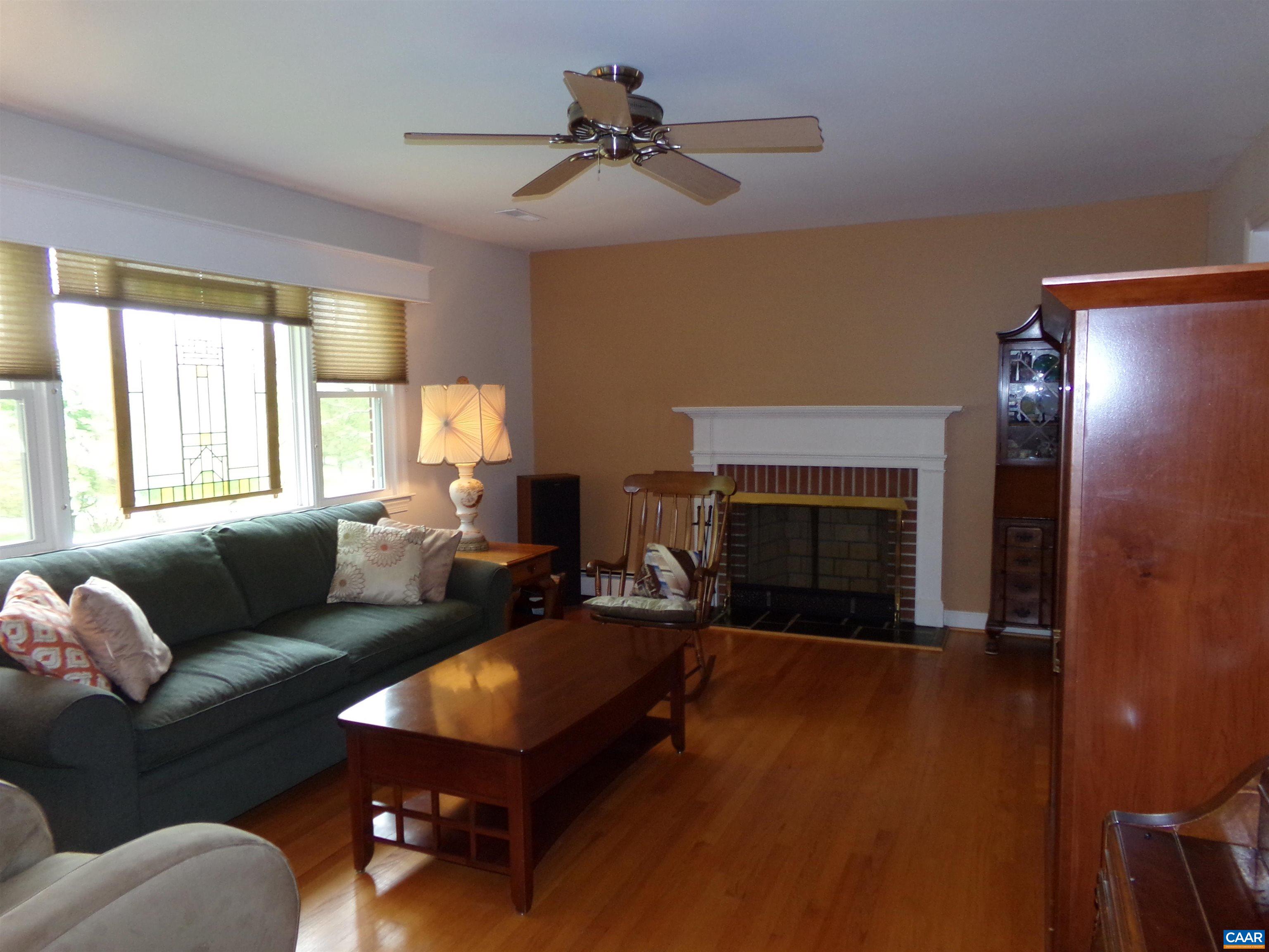 3011 Colonial Drive Charlottesville, VA 22911 - Photo 6 of 35 a living room with furniture and a fireplace