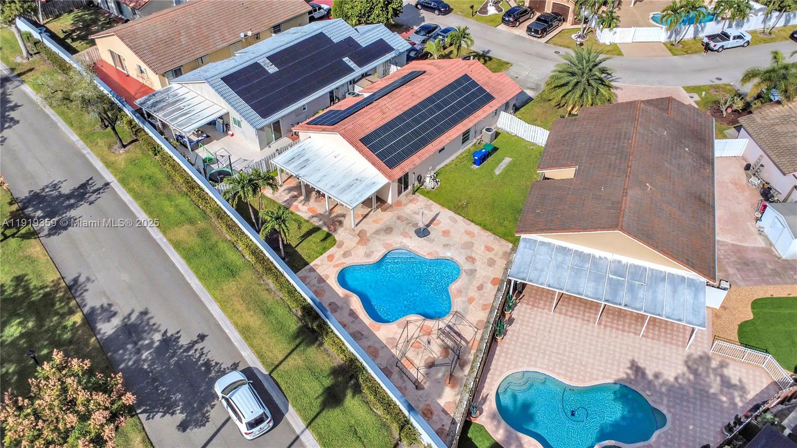 6122 Northwest 181st Terrace Circle West Hialeah, FL 33015 - Photo 27 of 28 an aerial view of a house