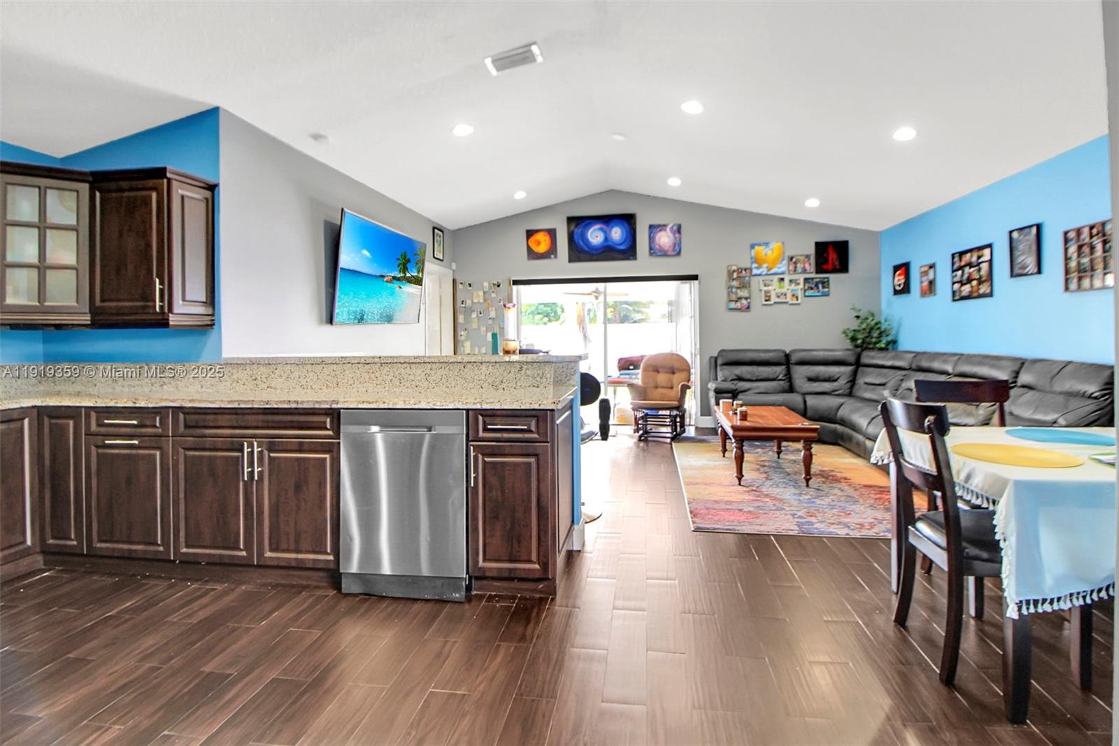 6122 Northwest 181st Terrace Circle West Hialeah, FL 33015 - Photo 8 of 28 a open kitchen with stainless steel appliances granite countertop a stove and cabinets