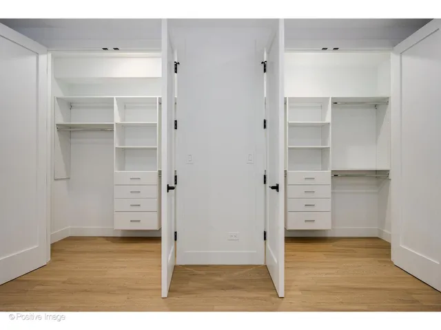 a view of a room with wooden cabinet