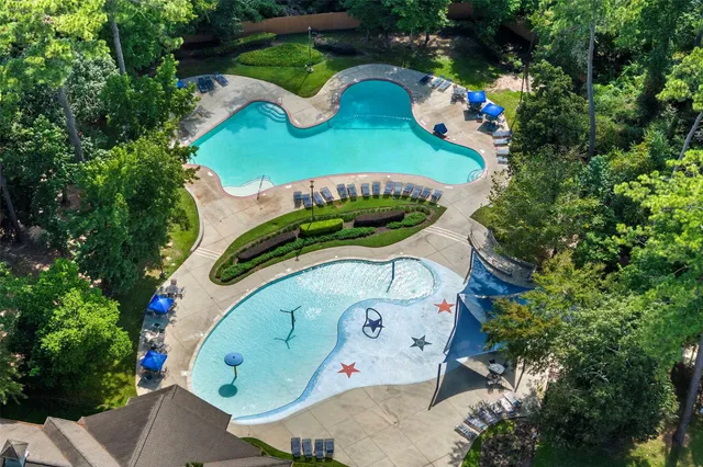 an aerial view of a swimming pool