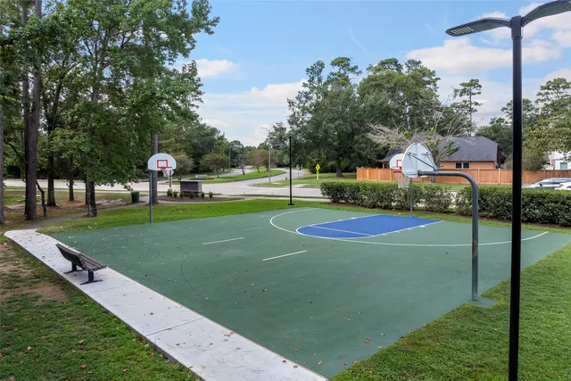 a view of a park with swings and slides
