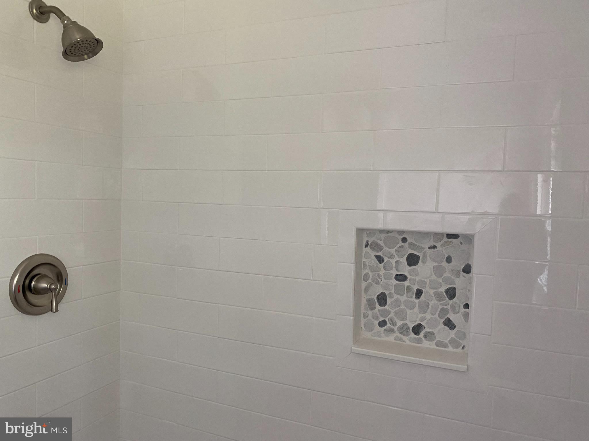 907 Sibley Road Baltimore, MD 21286 - Photo 18 of 36 Remodeled Hall Bath