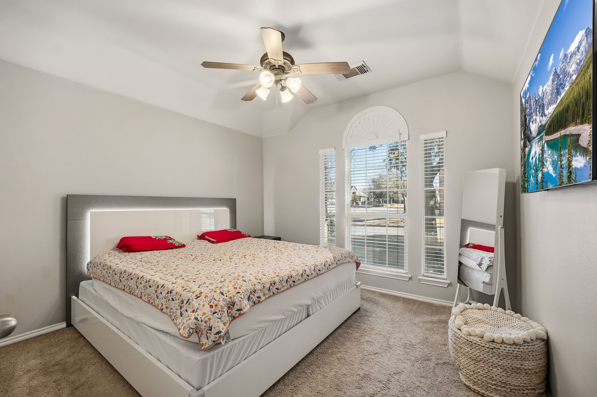 2112 Bandera Path Round Rock, TX 78665 - Photo 15 of 34 a bedroom with a bed and a chandelier