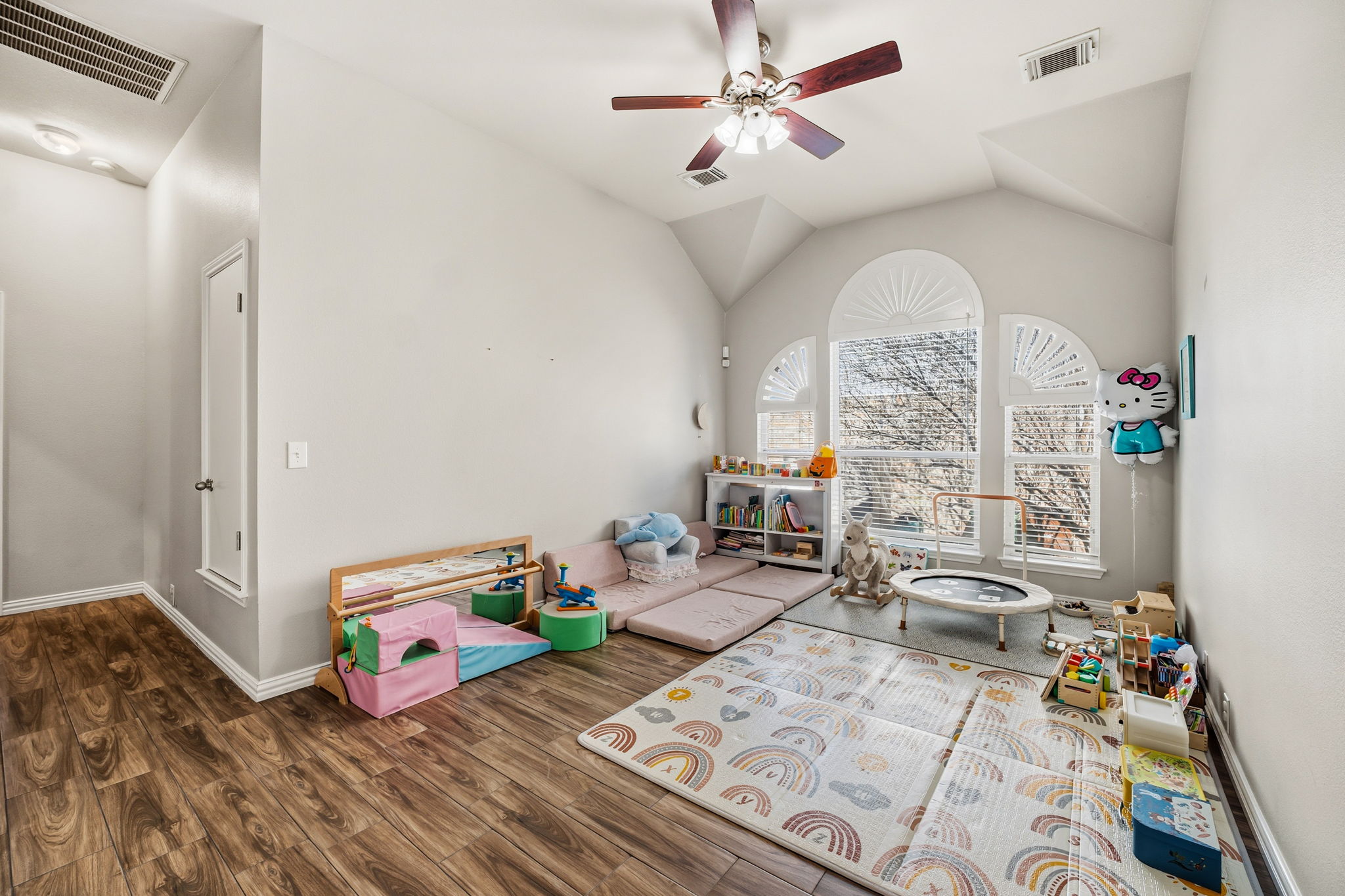 2112 Bandera Path Round Rock, TX 78665 - Photo 24 of 34 a living room with furniture chess floor to ceiling window and a rug