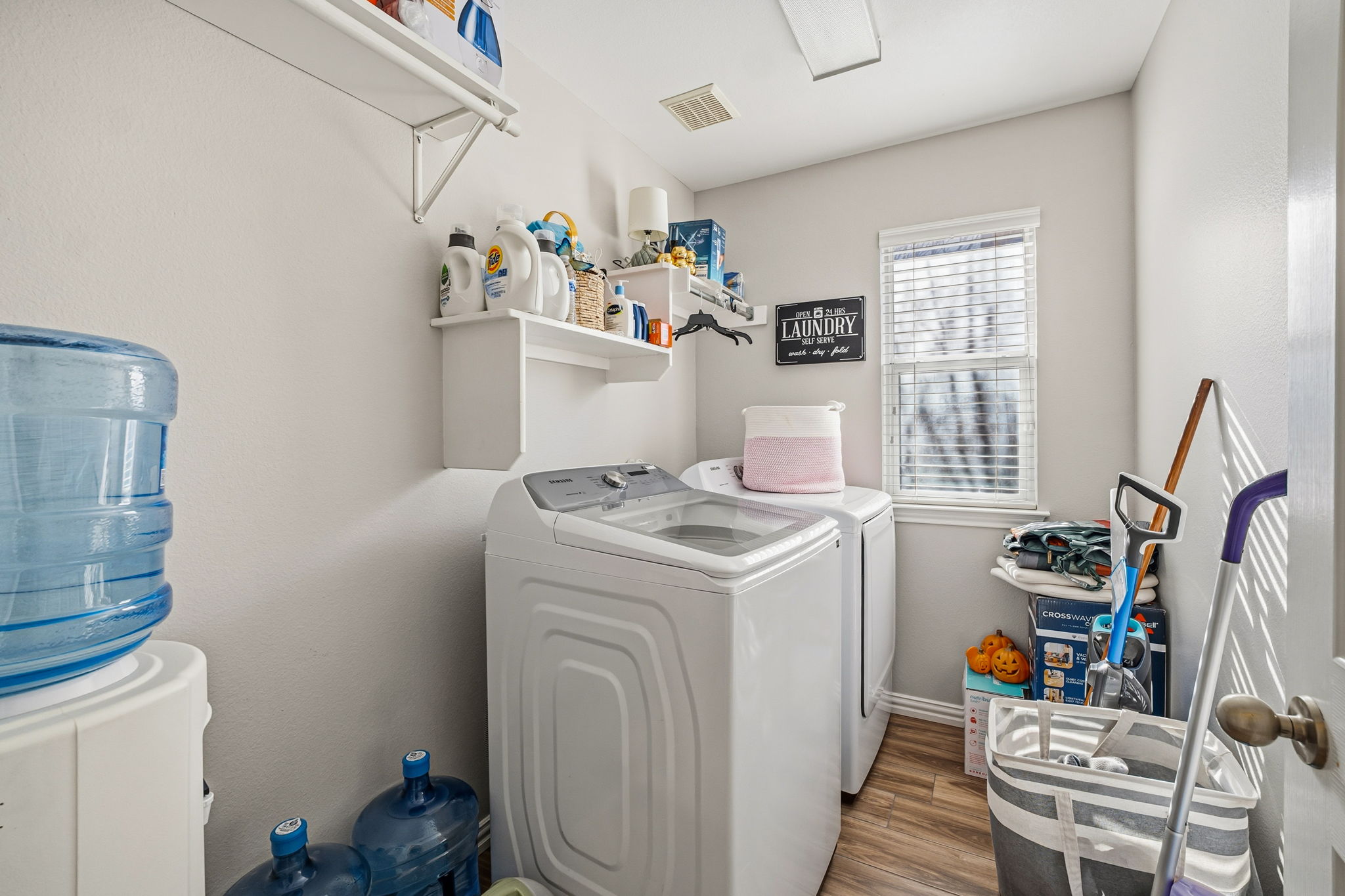 2112 Bandera Path Round Rock, TX 78665 - Photo 26 of 34 a view of storage and utility room with washer and dryer