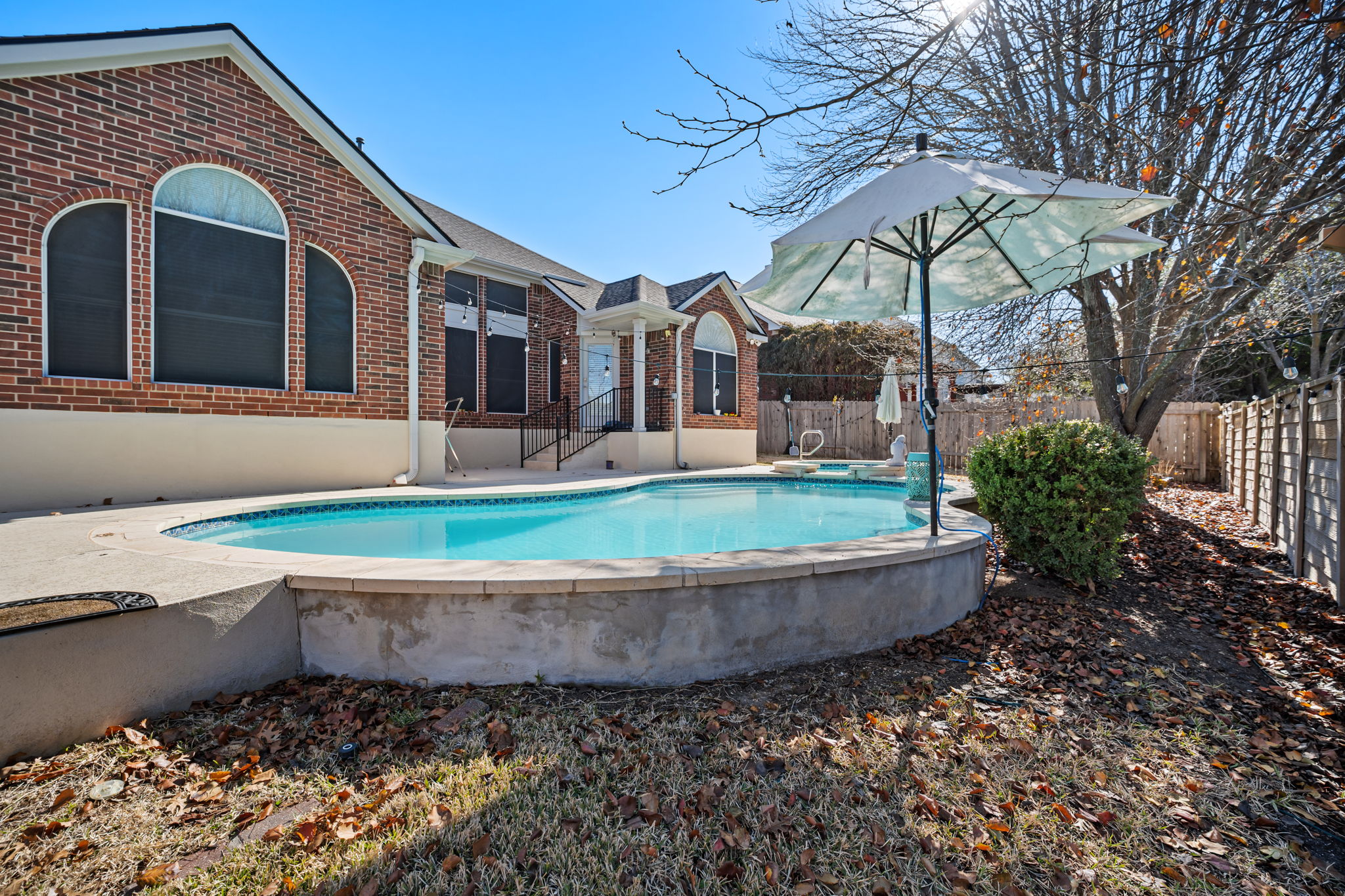 2112 Bandera Path Round Rock, TX 78665 - Photo 27 of 34 a front view of a house with garden